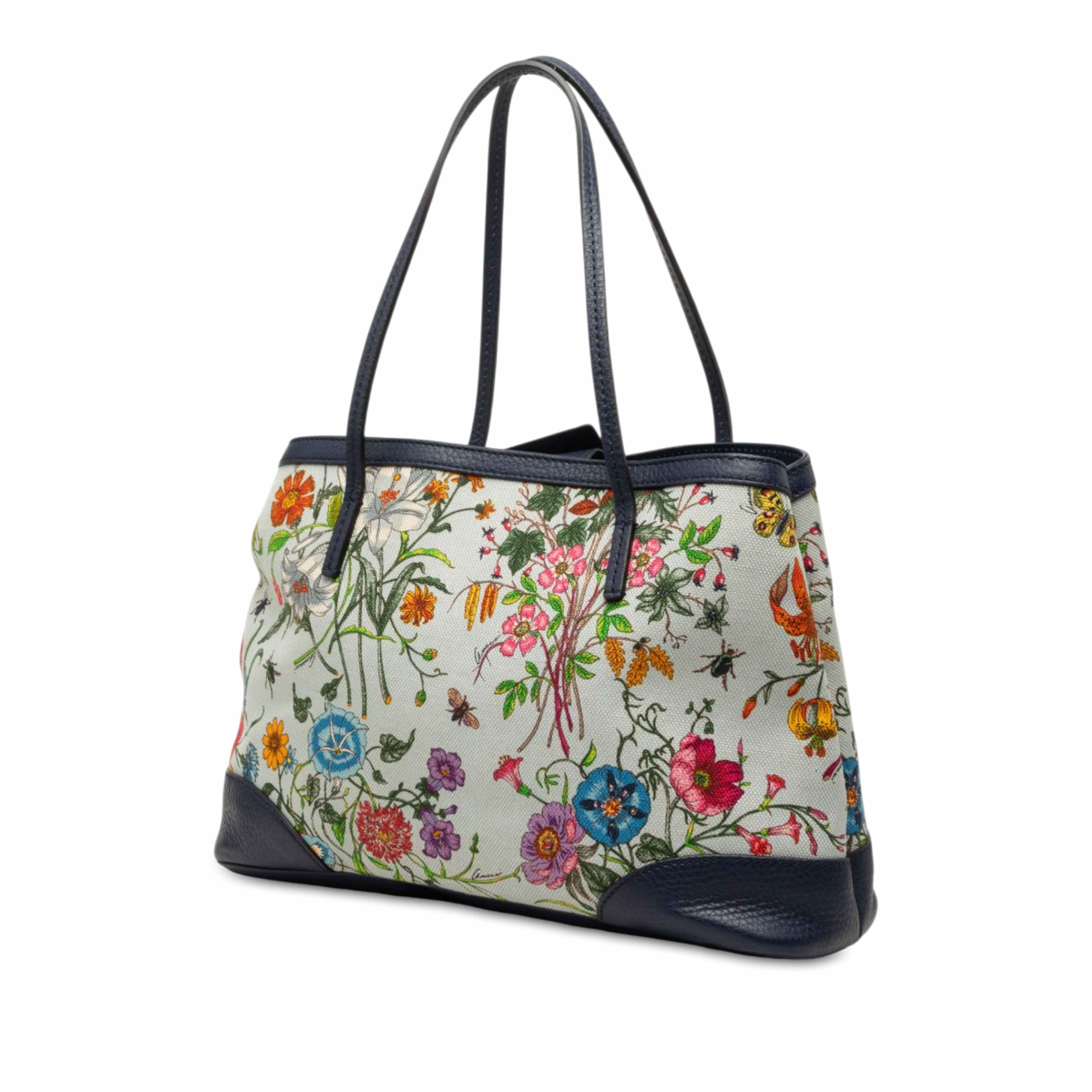 Gucci Medium Canvas Flora Tote, från Luxclusif, i färgen vit. Klicka för att öppna bilden i stort format
