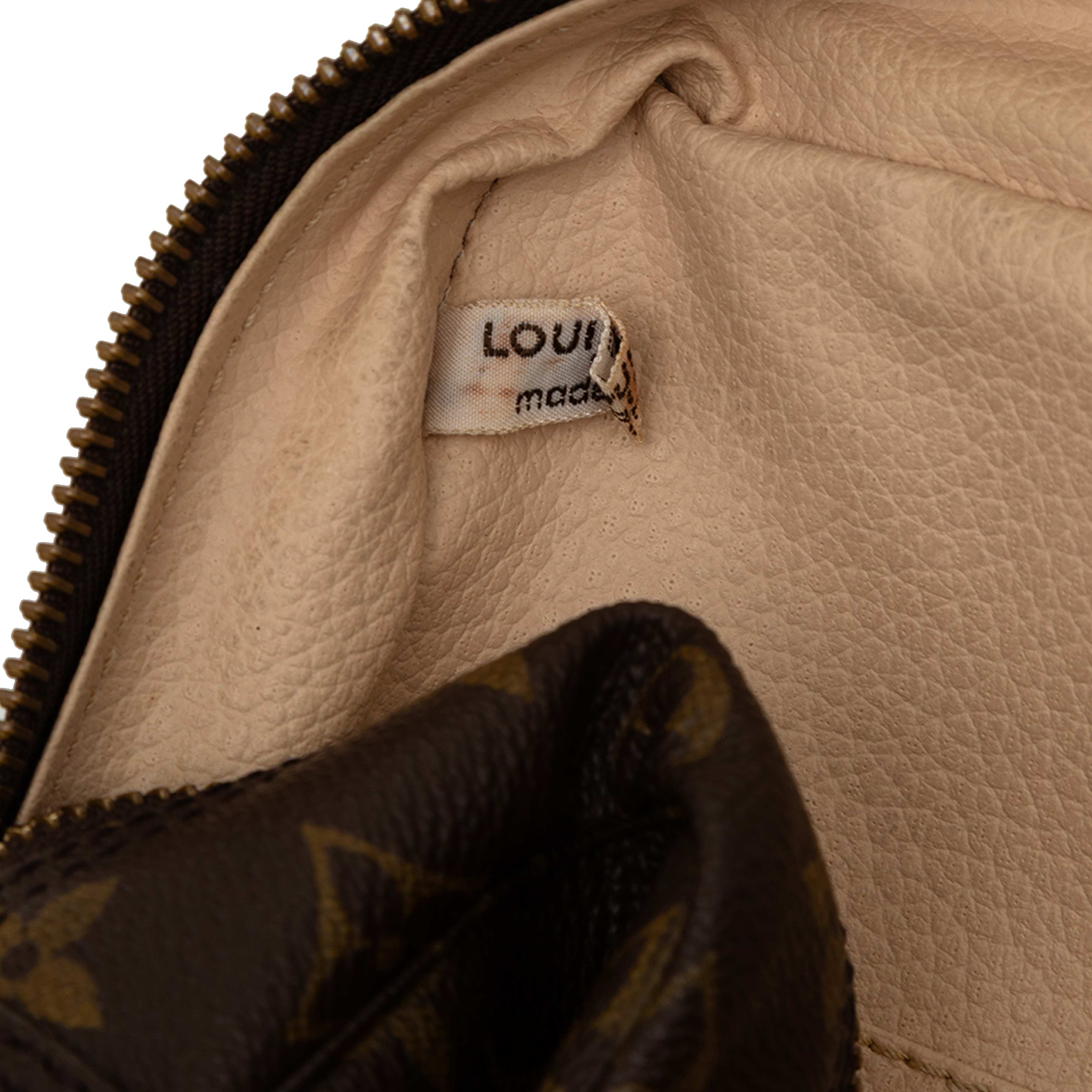 Louis Vuitton Monogram Trousse Toilette 28, från Luxclusif, i färgen brown. Klicka för att öppna bilden i stort format