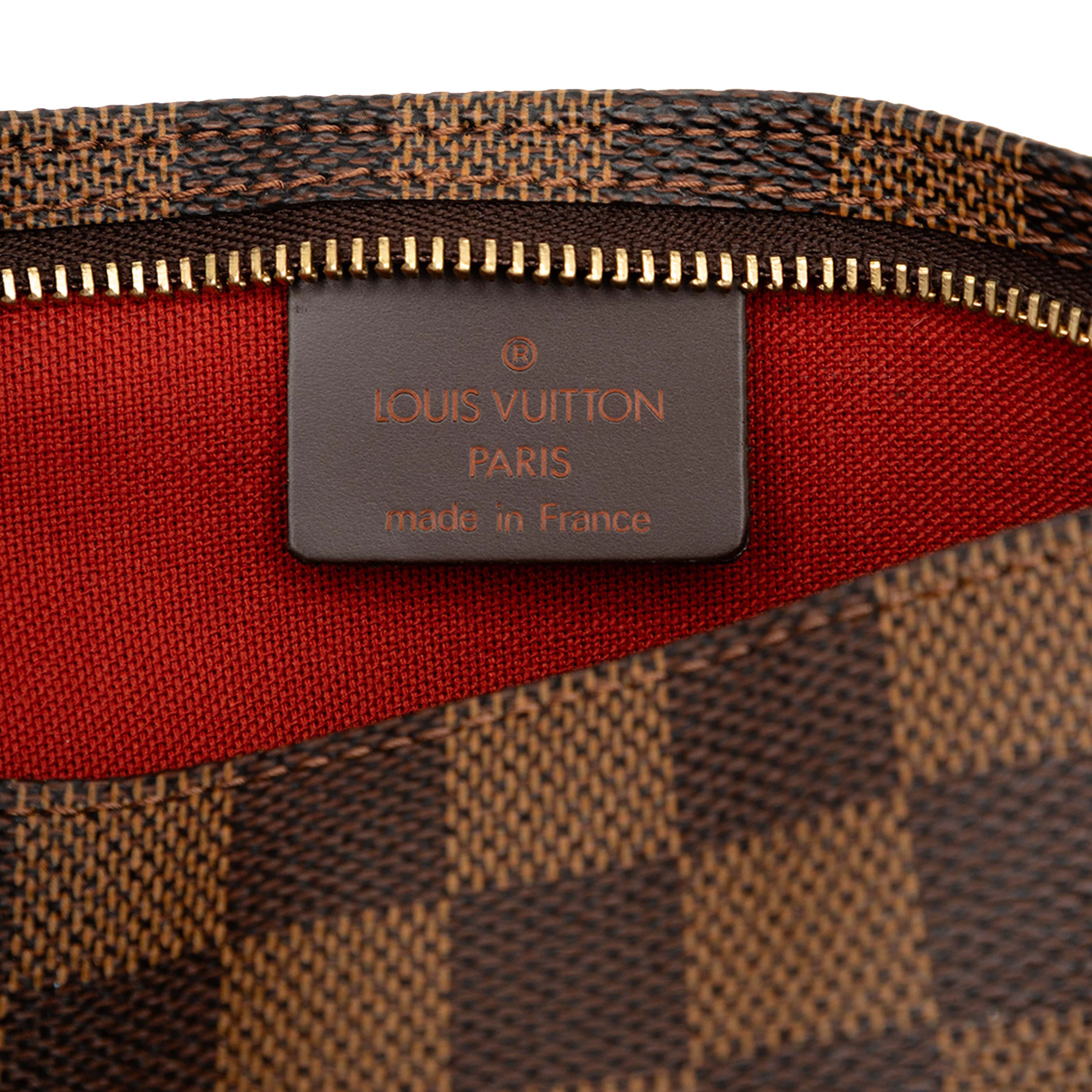 Louis Vuitton Damier Ebene Navona, från Luxclusif, i färgen brun. Klicka för att öppna bilden i stort format