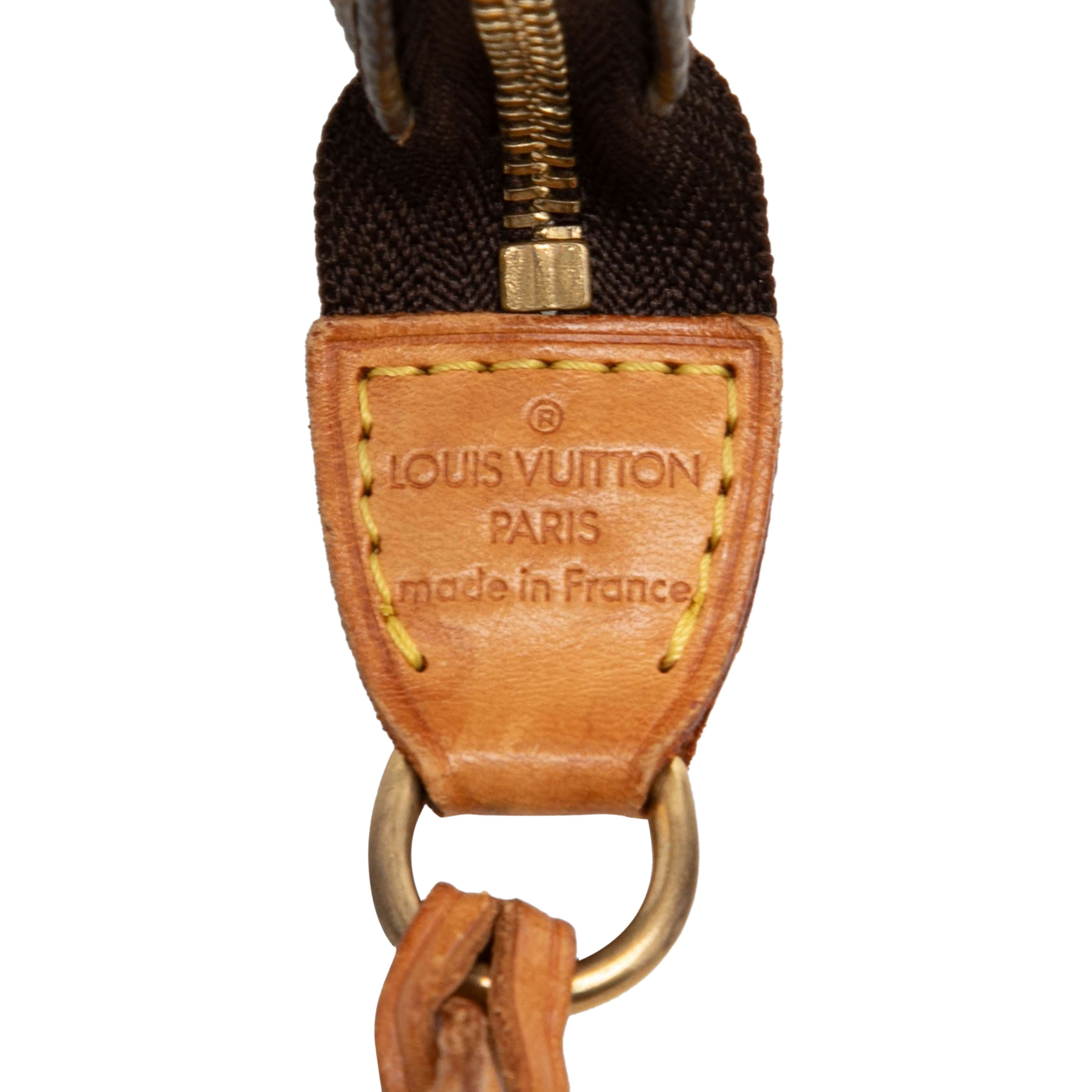 Louis Vuitton Monogram Pochette Accessoires, från Luxclusif, i färgen brun. Klicka för att öppna bilden i stort format
