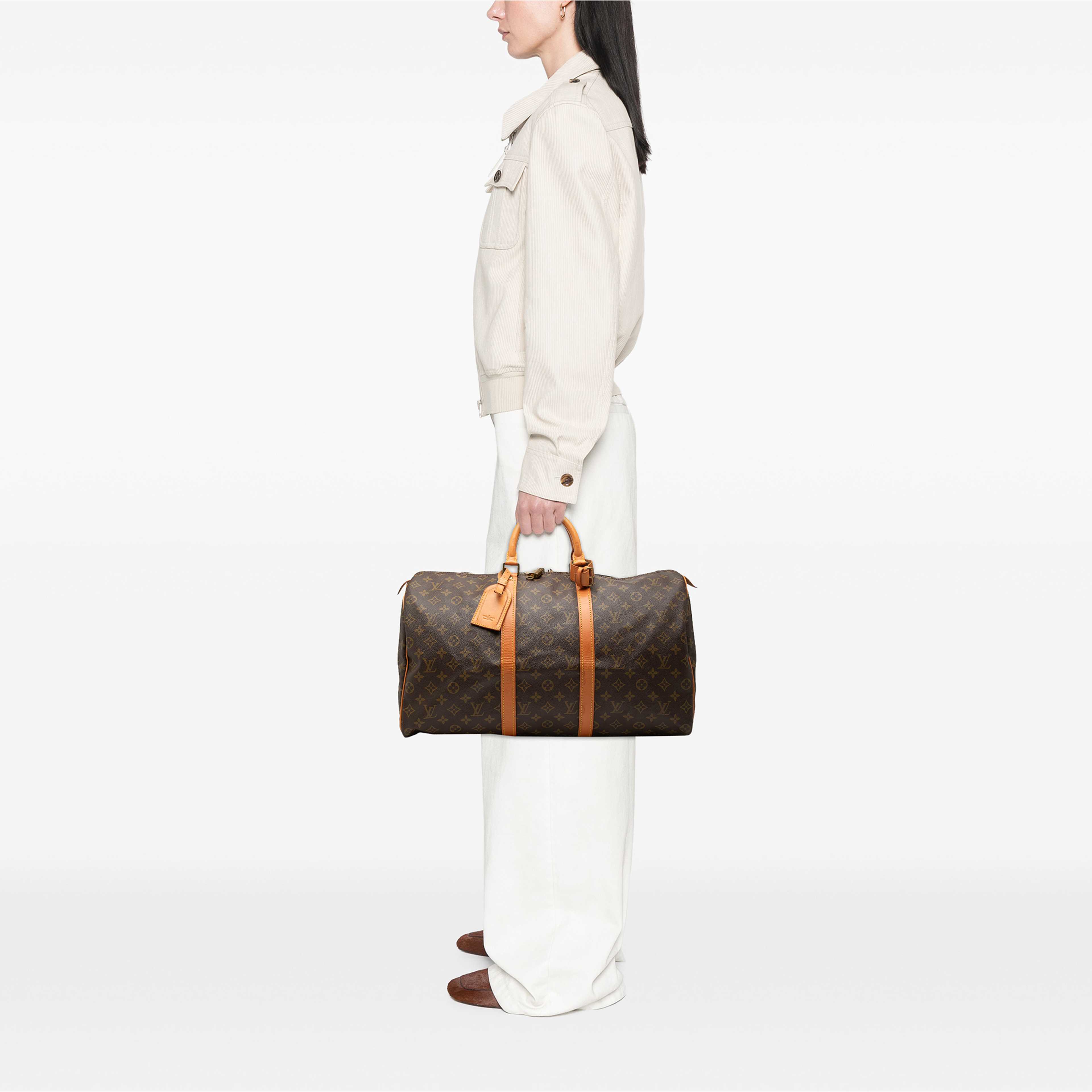 Louis Vuitton Monogram Keepall 50, från Luxclusif, i färgen brun. Klicka för att öppna bilden i stort format