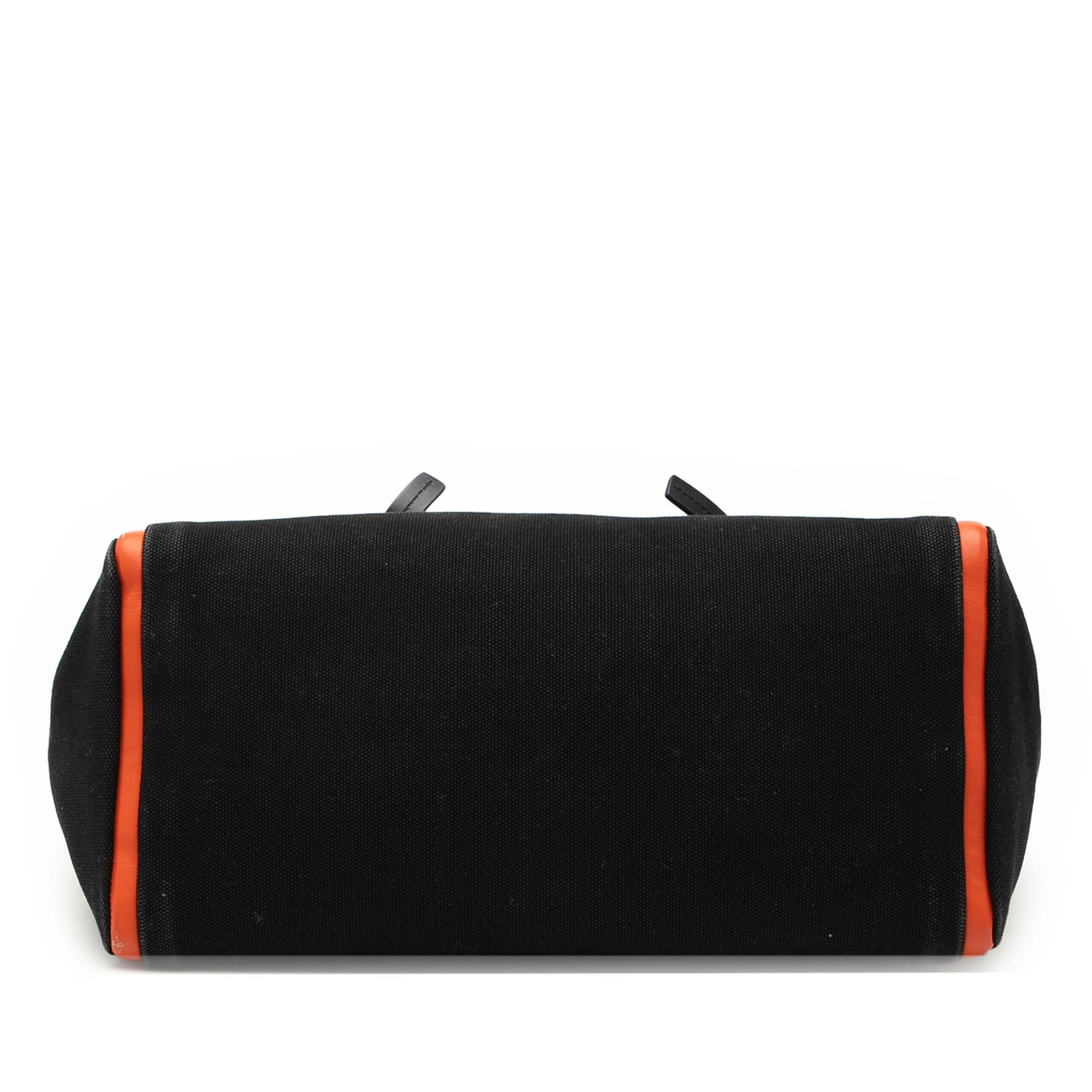 Prada Medium Canvas Ouverture Satchel, från Luxclusif, i färgen black. Klicka för att öppna bilden i stort format