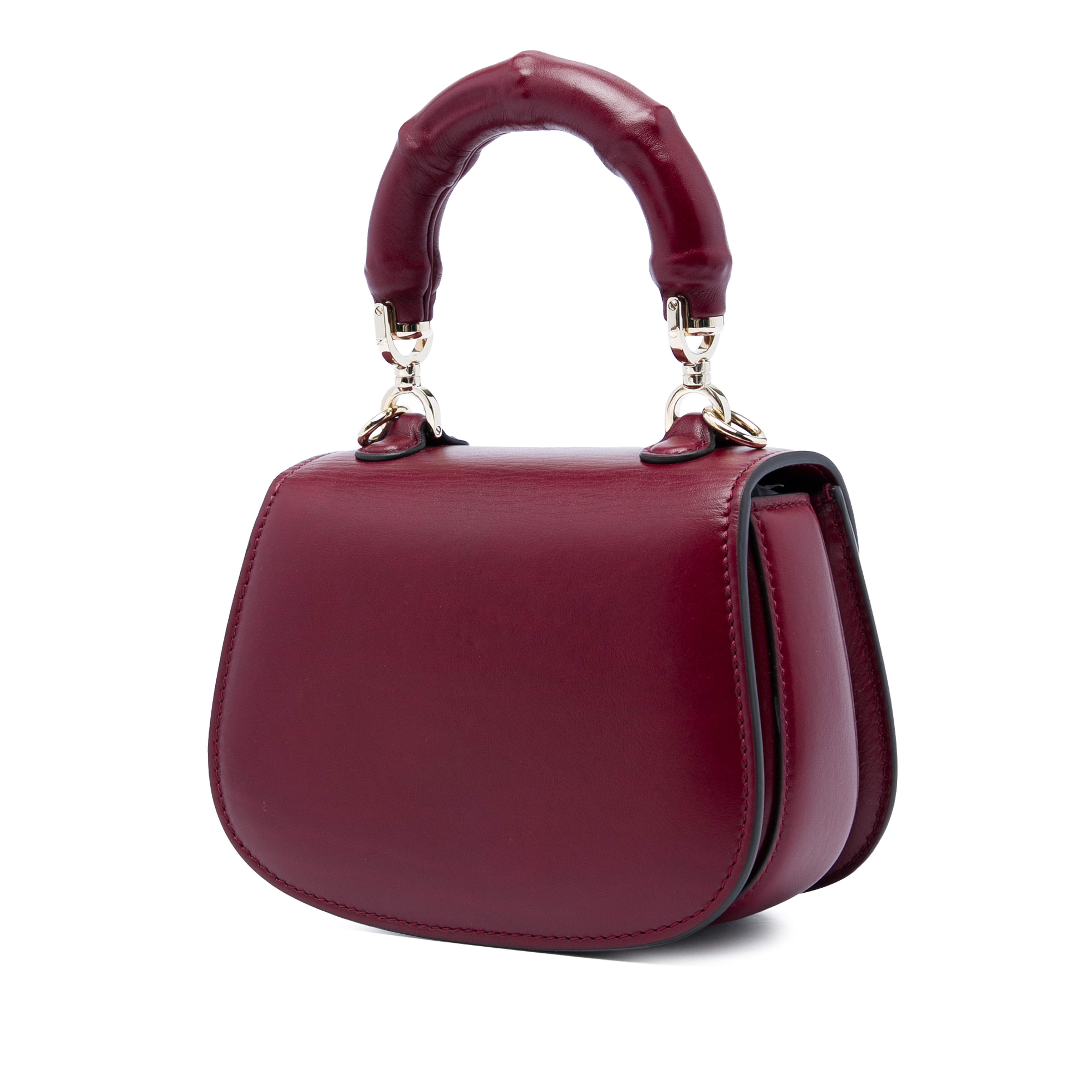 Gucci Mini Calfskin Bamboo Night, från Luxclusif, i färgen röd. Klicka för att öppna bilden i stort format