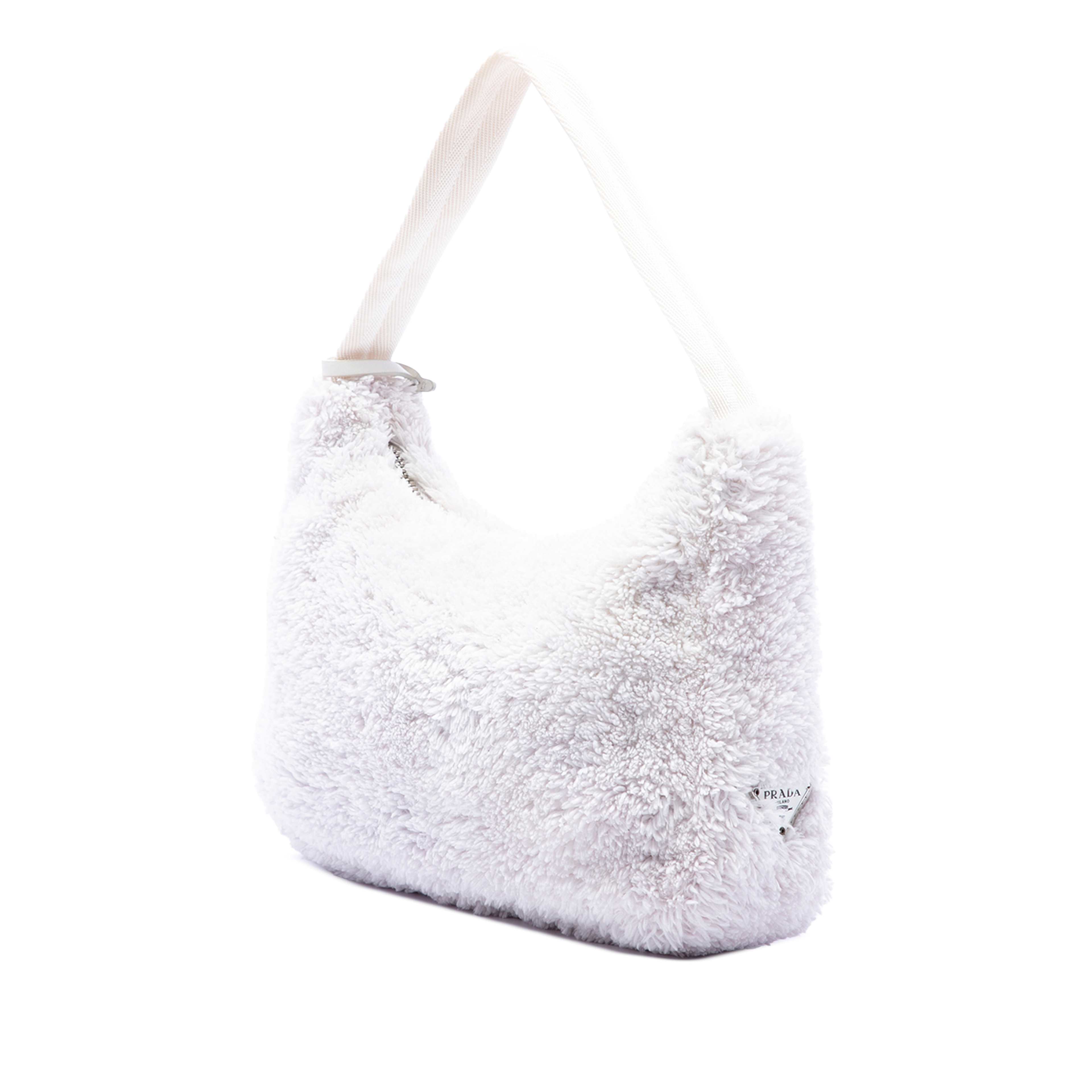 Prada Mini Terry Re Edition 2000 Shoulder Bag, från Luxclusif, i färgen vit. Klicka för att öppna bilden i stort format