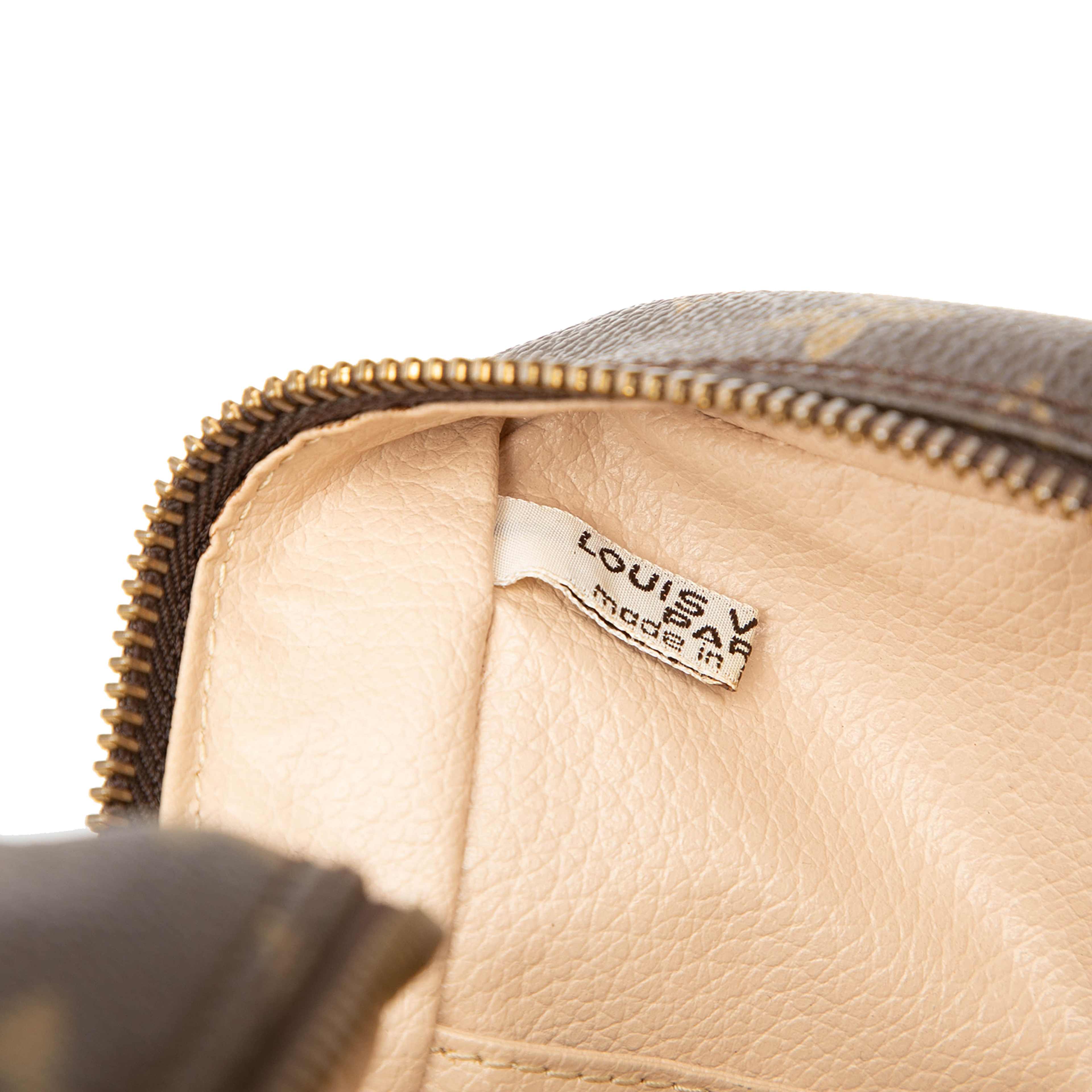 Louis Vuitton Monogram Trousse Toilette 28, från Luxclusif, i färgen brown. Klicka för att öppna bilden i stort format