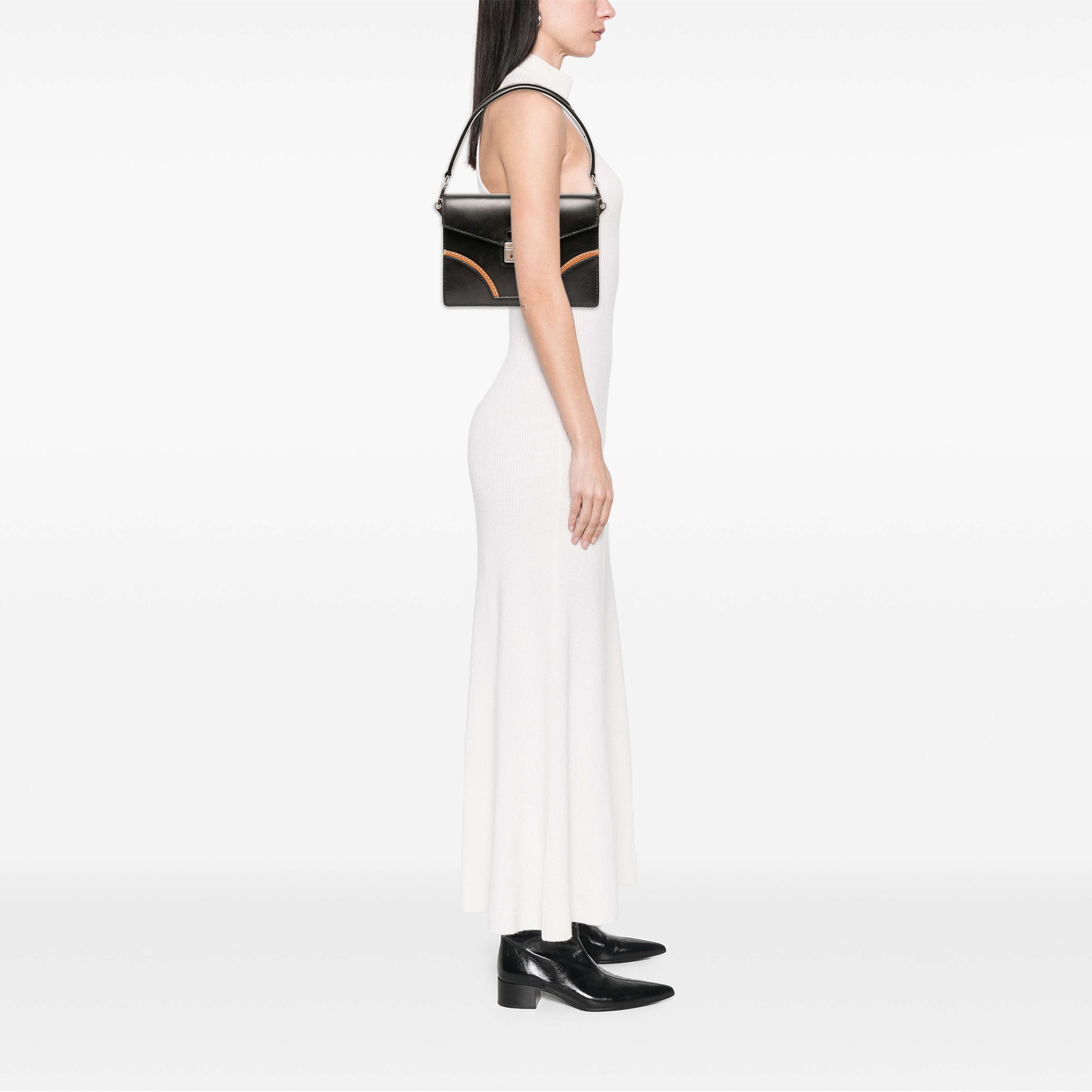 Prada Vitello Stitched Sound Lock Satchel, från Luxclusif, i färgen svart. Klicka för att öppna bilden i stort format