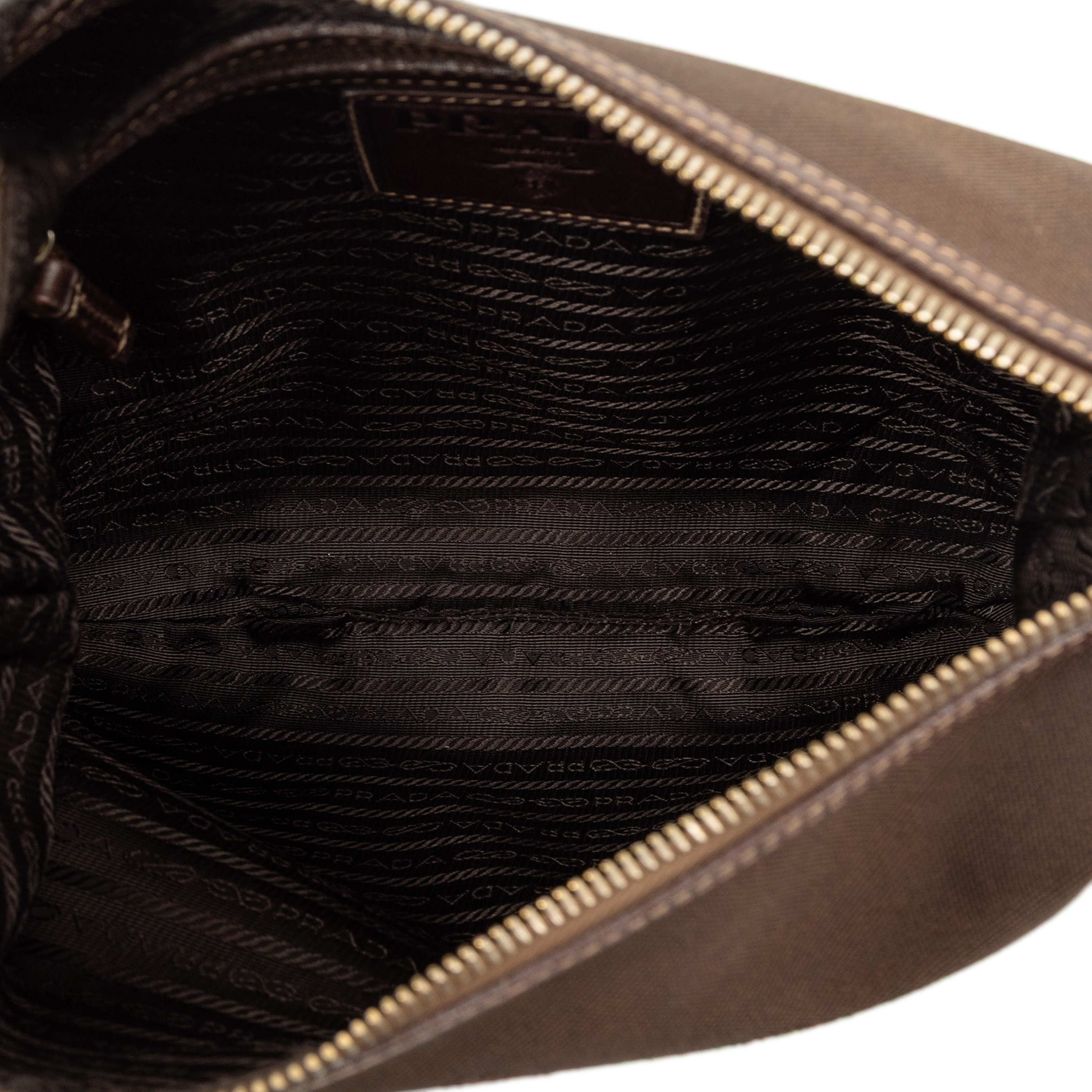 Prada Canvas Canapa Logo Crossbody, från Luxclusif, i färgen dark brown. Klicka för att öppna bilden i stort format