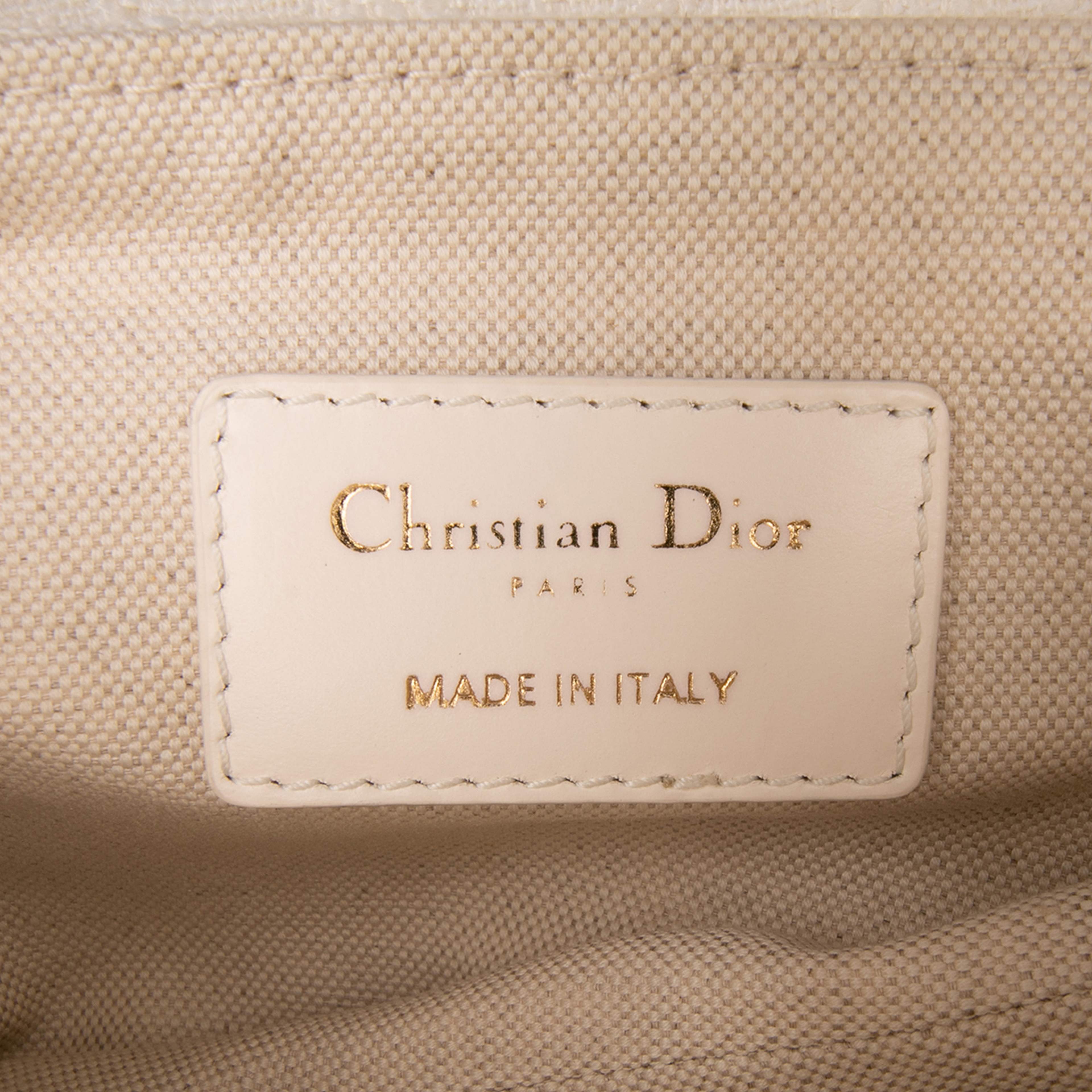 Dior Mini Oblique Canvas Saddle Bag, från Luxclusif, i färgen white.