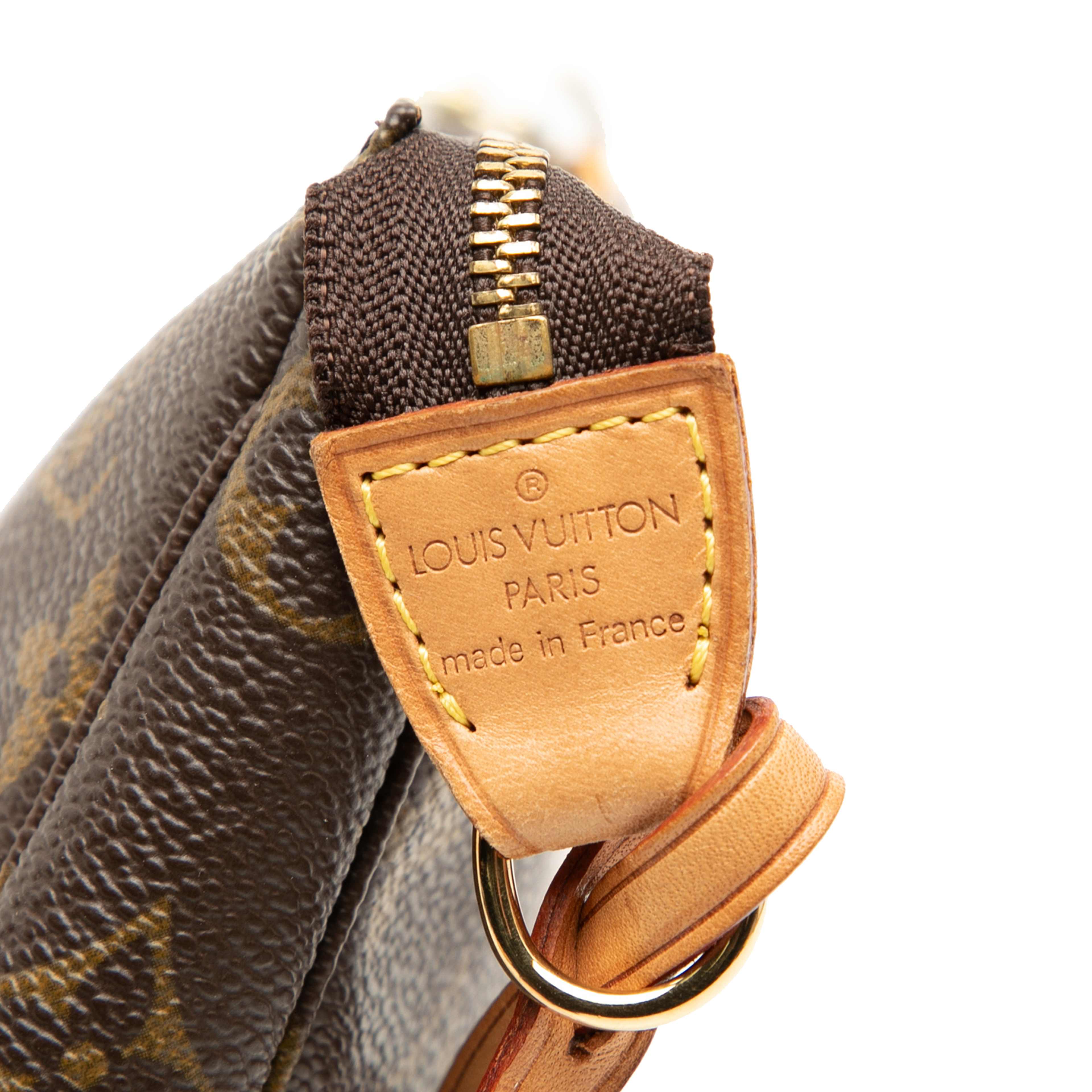 Louis Vuitton Monogram Pochette Accessoires, från Luxclusif, i färgen brown. Klicka för att öppna bilden i stort format