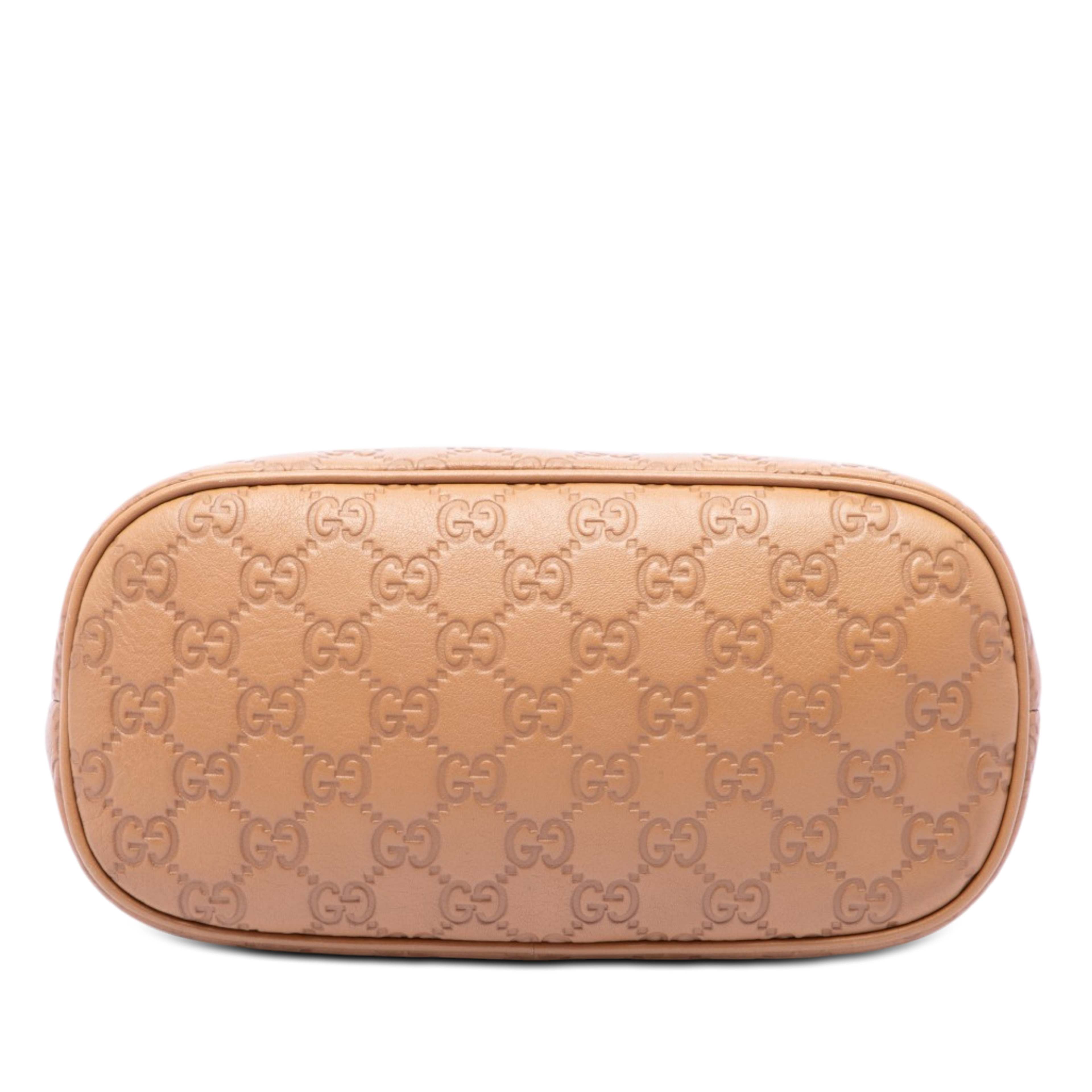 Gucci Mini Guccissima Dome Satchel, från Luxclusif, i färgen brun. Klicka för att öppna bilden i stort format