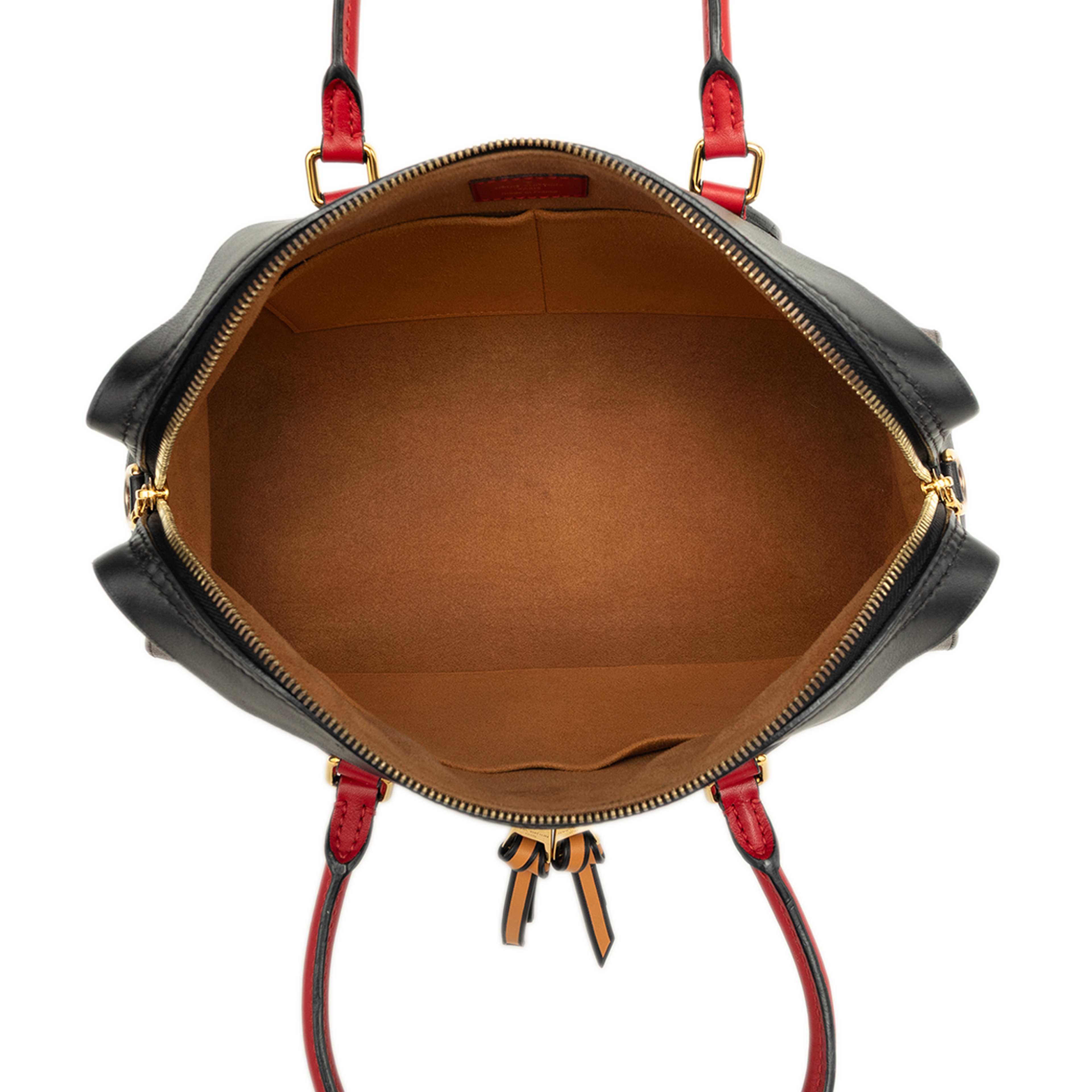 Louis Vuitton Monogram Tuileries, från Luxclusif, i färgen brun. Klicka för att öppna bilden i stort format