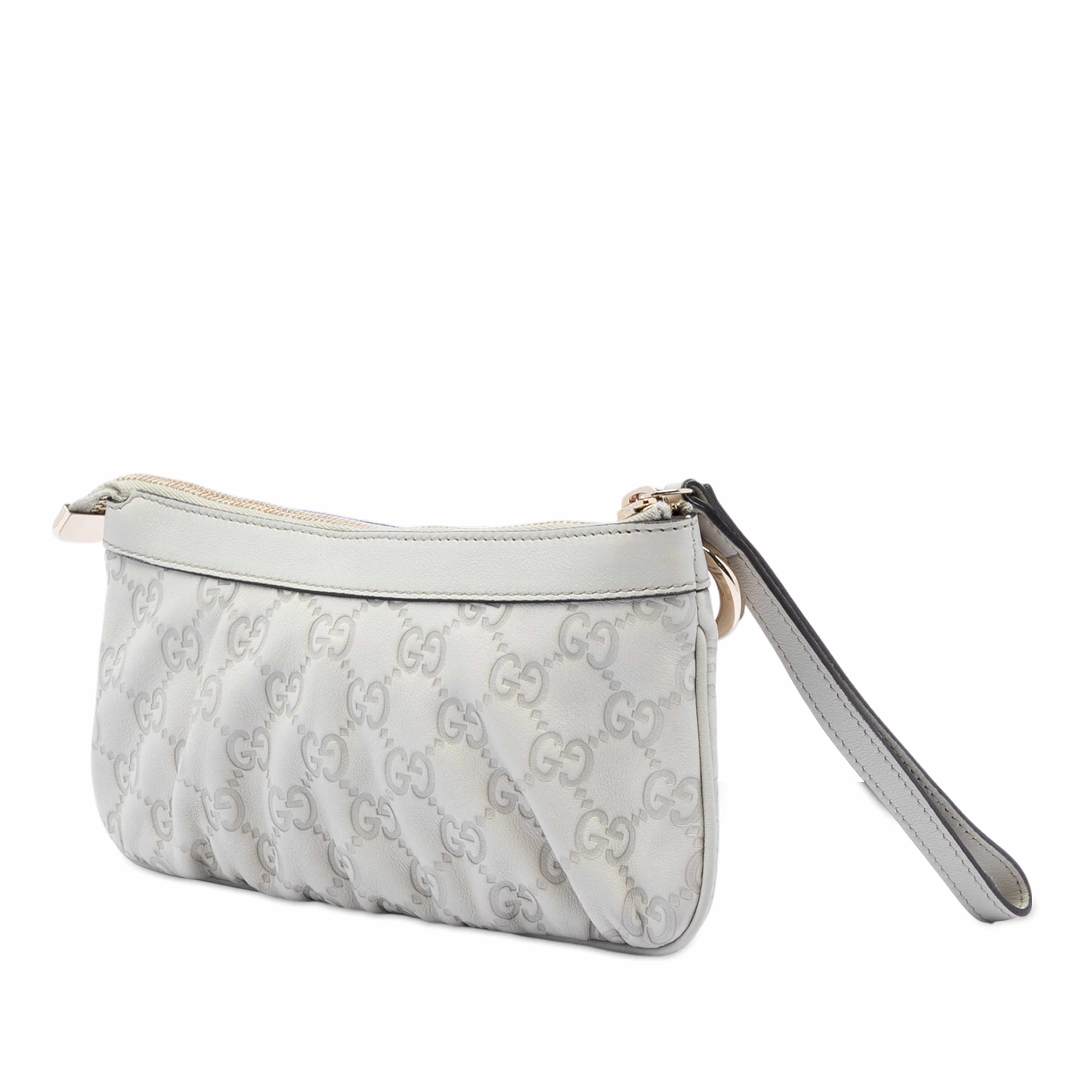 Gucci Guccissima New Britt Wristlet Clutch, från Luxclusif, i färgen white. Klicka för att öppna bilden i stort format