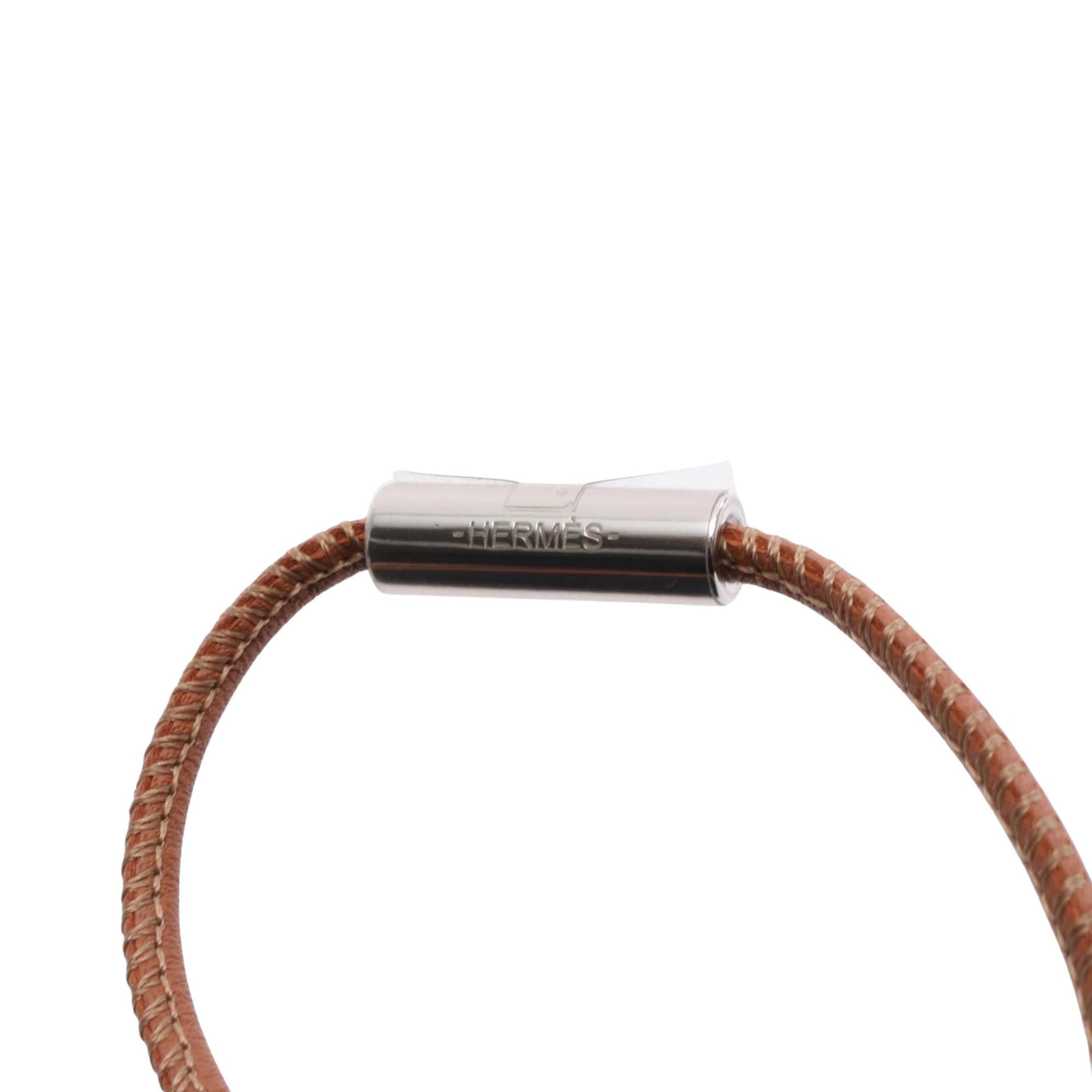 Hermès Swift And Stainless Steel Loop Grand Pendant Necklace, från Luxclusif, i färgen brown. Klicka för att öppna bilden i stort format