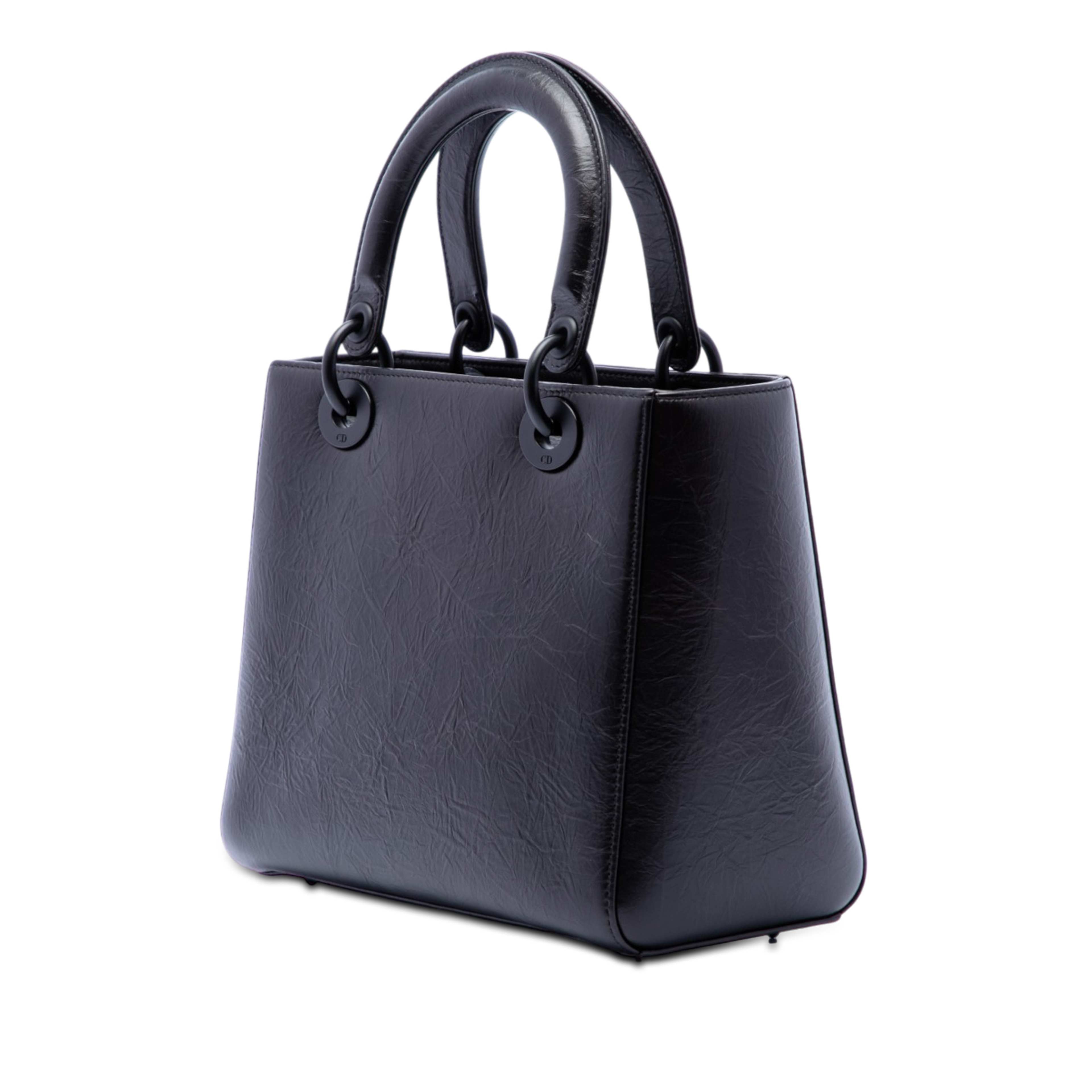 Dior Medium Crinkled Calfskin Eiffel Tower Lady Dior, från Luxclusif, i färgen svart. Klicka för att öppna bilden i stort format