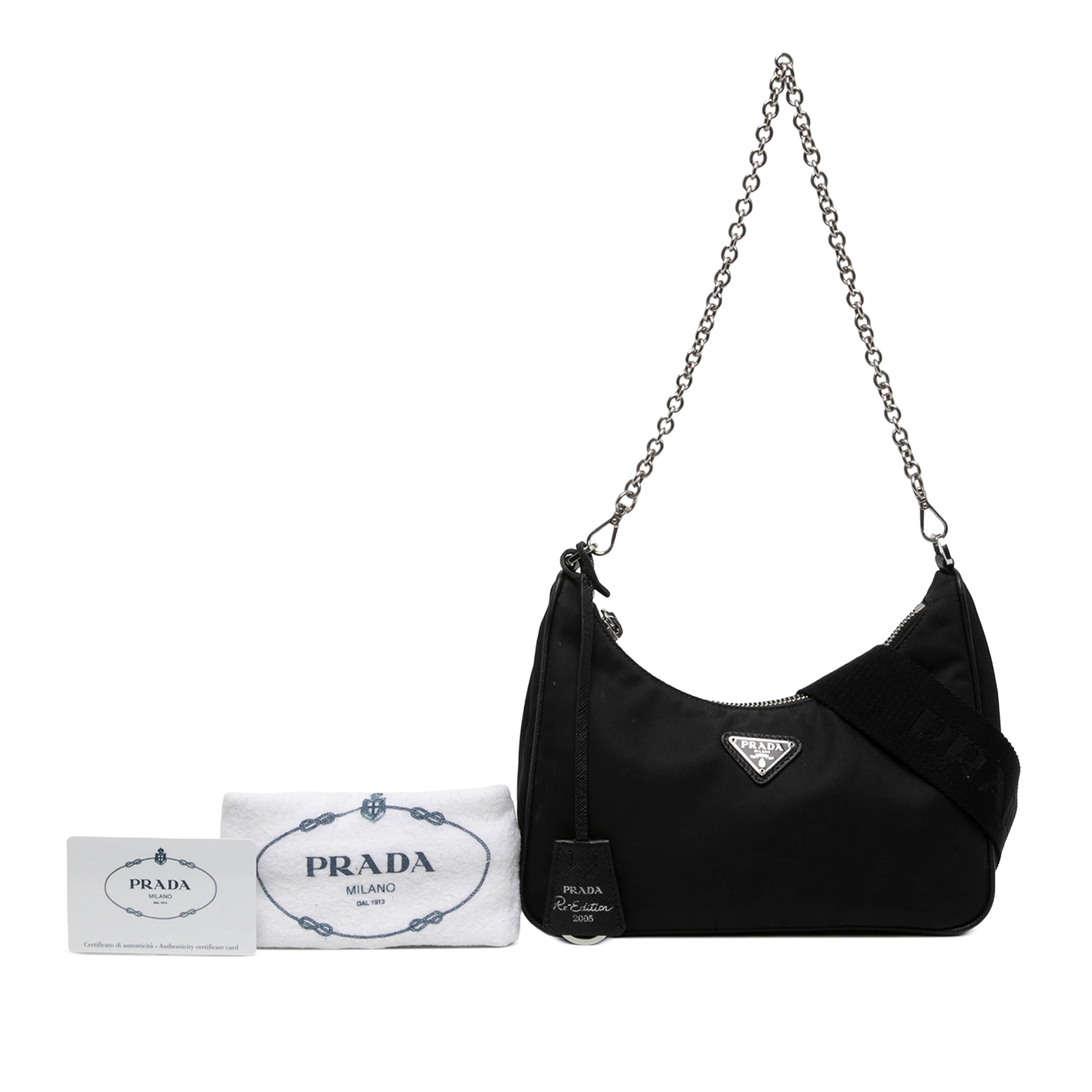 Prada Mini Saffiano Trimmed Tessuto Re Edition 2005 Satchel, från Luxclusif, i färgen svart. Klicka för att öppna bilden i stort format