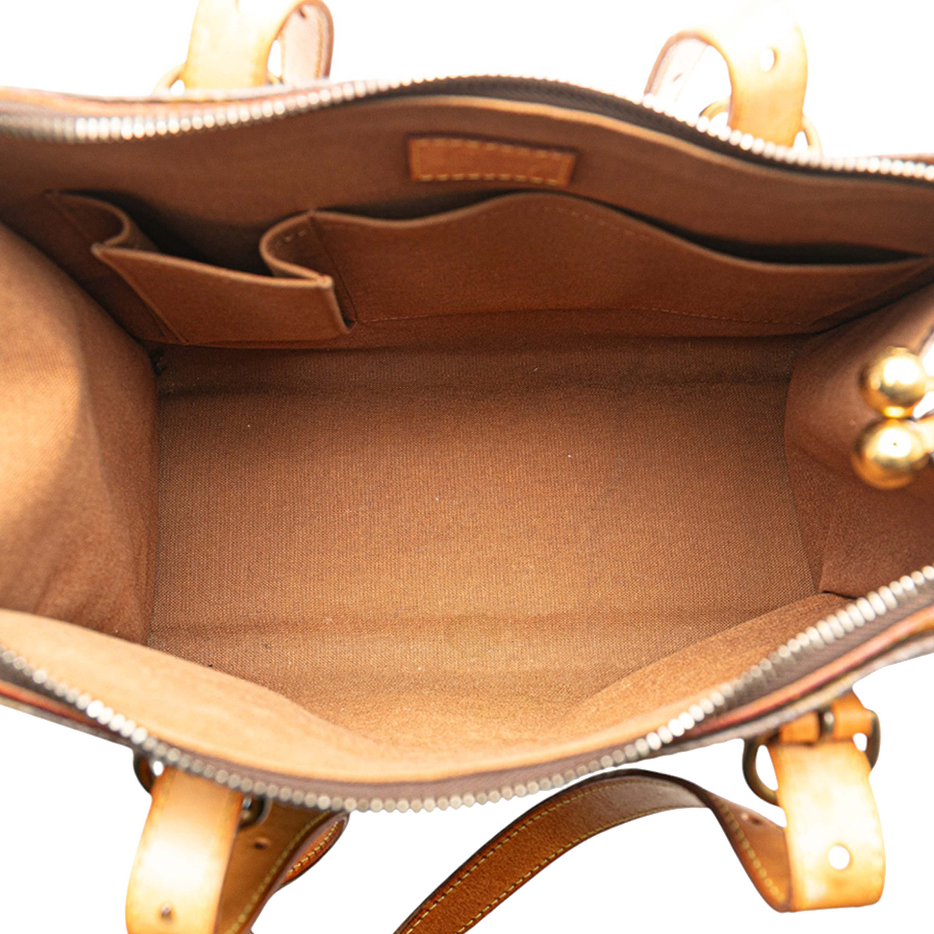 Louis Vuitton Monogram Popincourt Haut, från Luxclusif, i färgen brown. Klicka för att öppna bilden i stort format