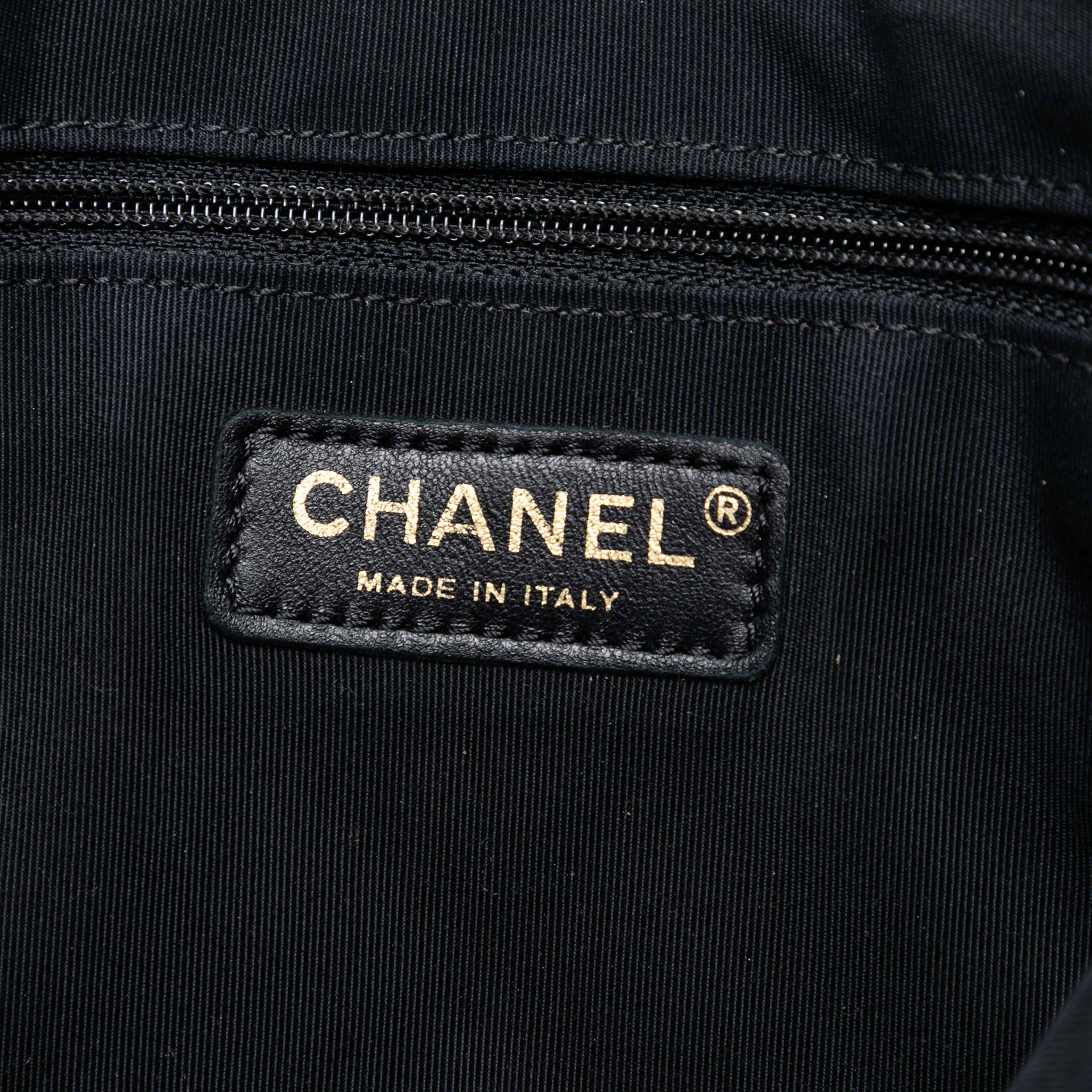 Chanel Small Quilted Lambskin Girl Clutch On Chain, från Luxclusif, i färgen beige. Klicka för att öppna bilden i stort format