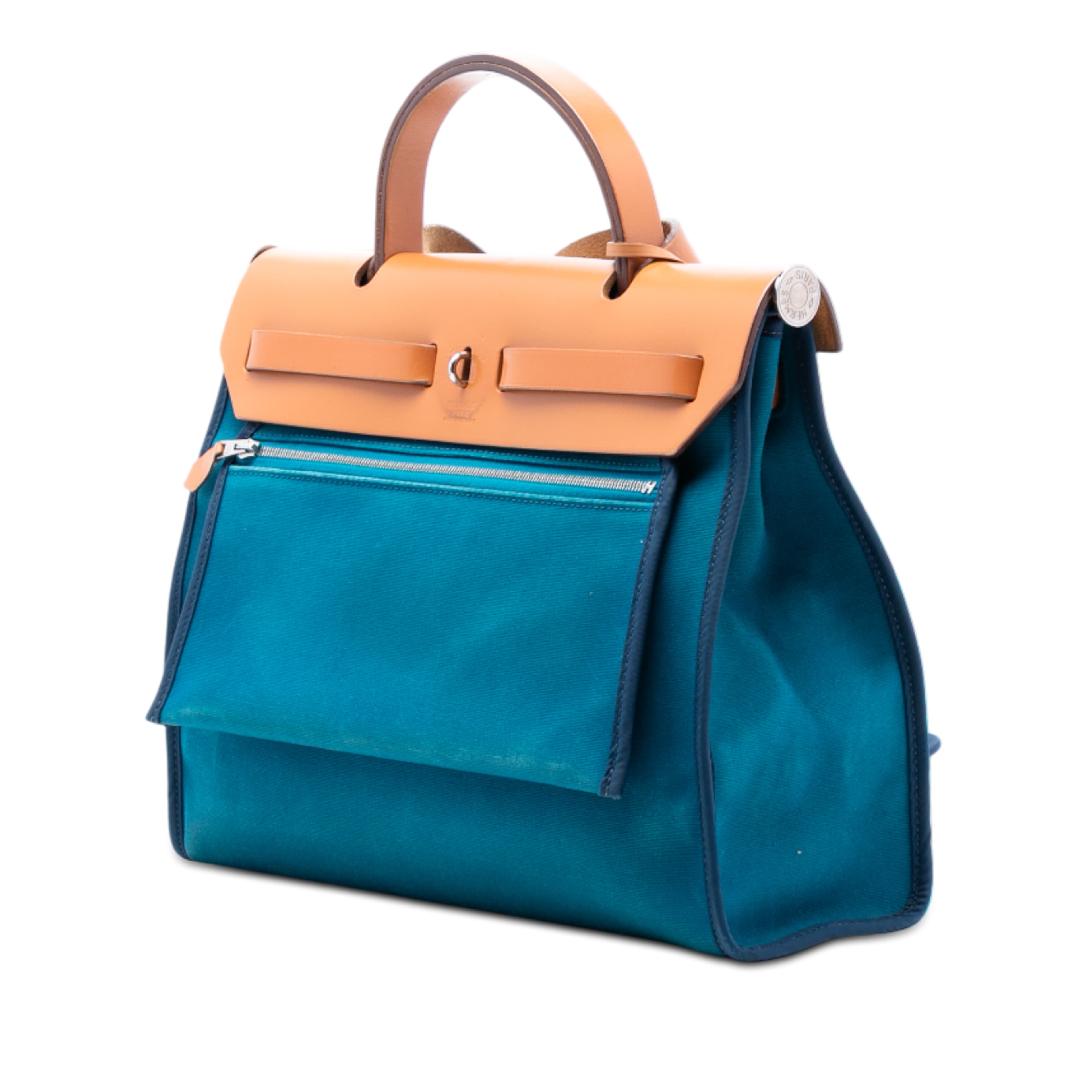 Hermès Toile Herbag Zip 31, från Luxclusif, i färgen blue. Klicka för att öppna bilden i stort format