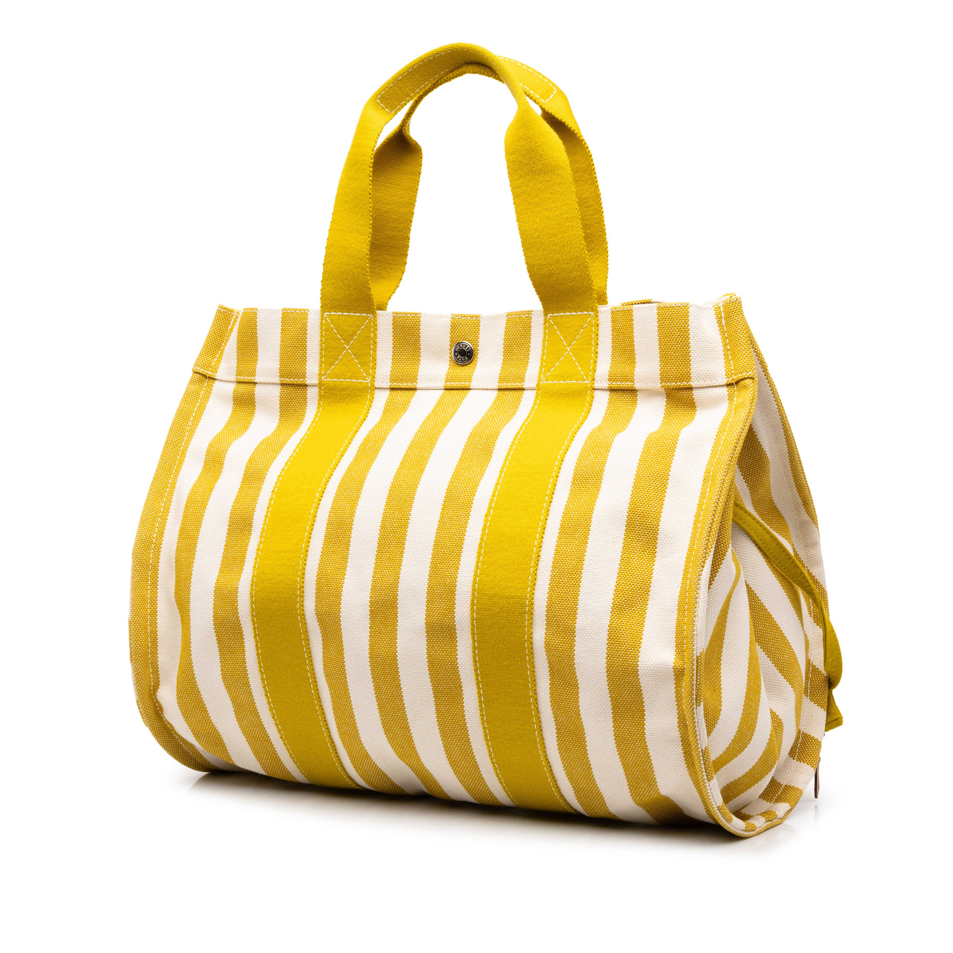 Hermès Toile Cannes Mm, från Luxclusif, i färgen gul. Klicka för att öppna bilden i stort format
