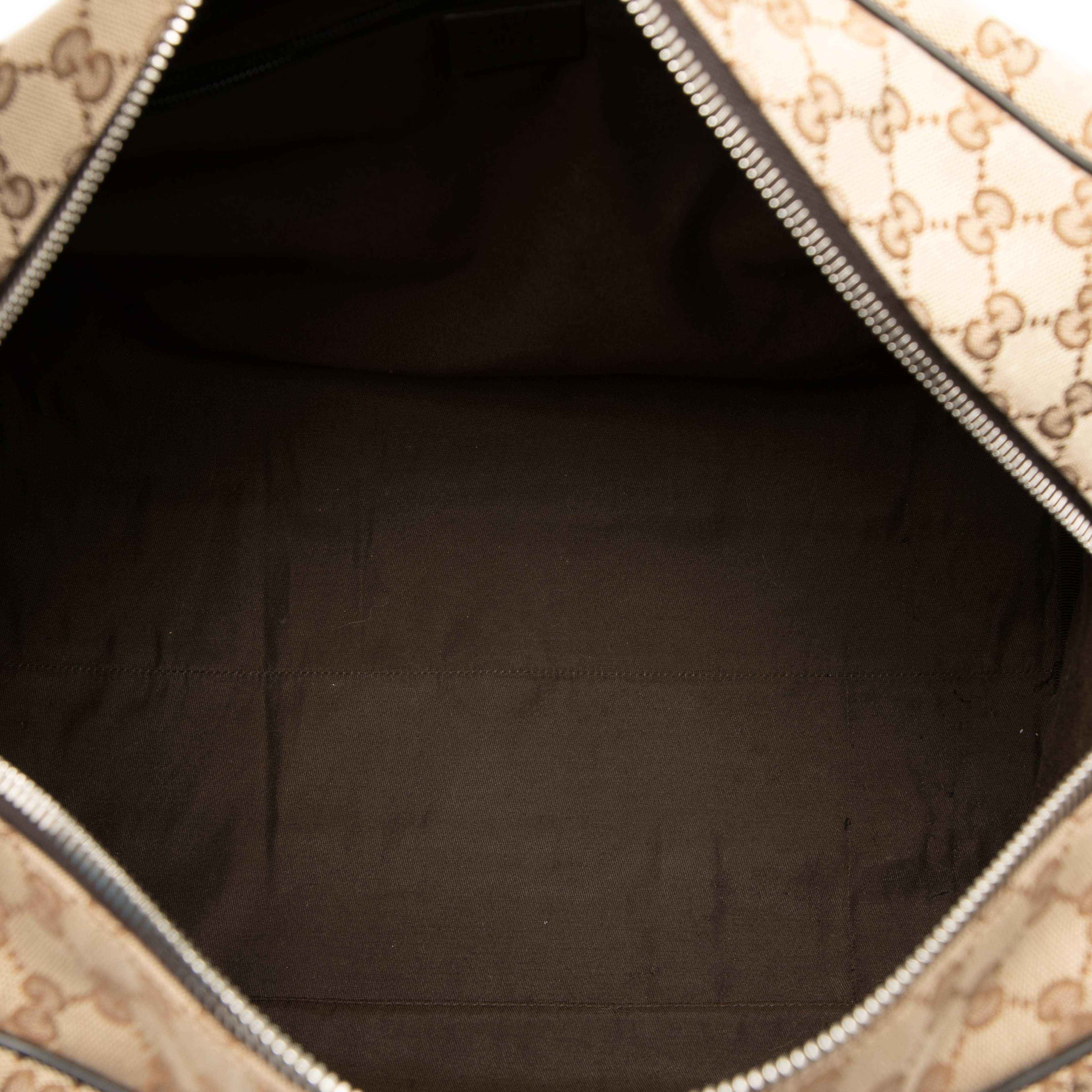 Gucci Gg Canvas Travel Bag, från Luxclusif, i färgen beige. Klicka för att öppna bilden i stort format