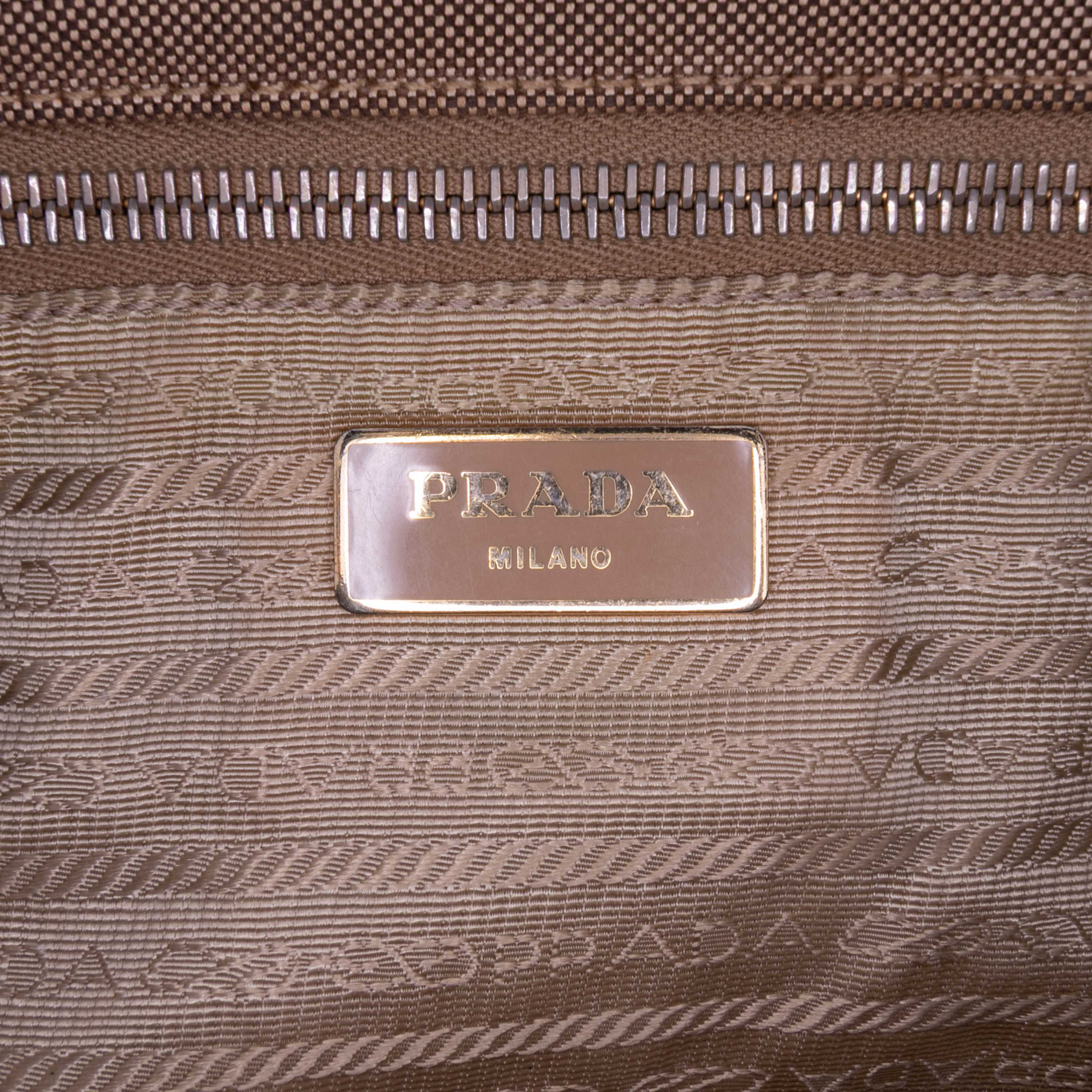 Prada Canvas Canapa Logo Tote, från Luxclusif, i färgen brown.