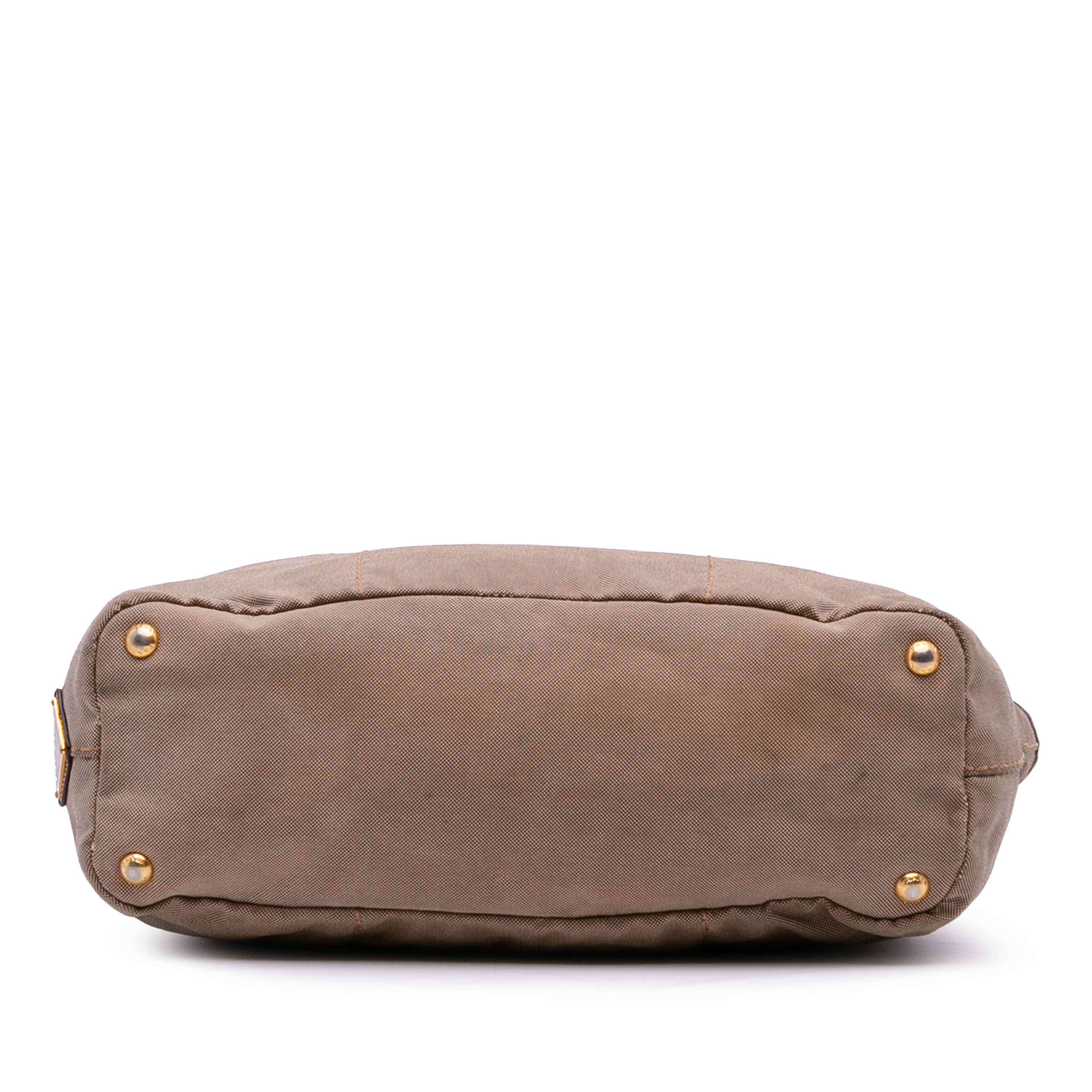 Prada Canvas Canapa Logo Tote, från Luxclusif, i färgen brown.