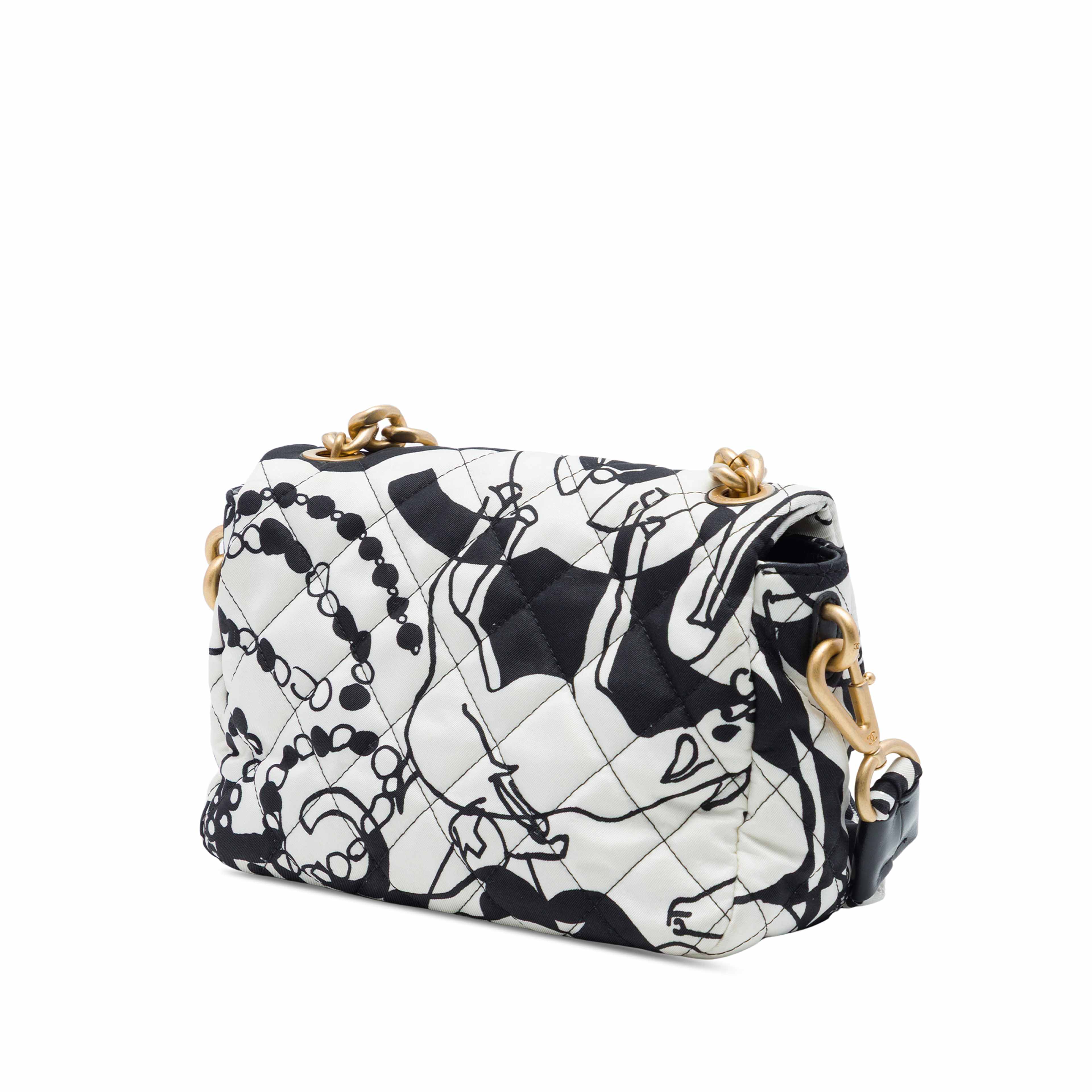 Chanel Mini Printed Canvas Deer Coco Flap, från Luxclusif, i färgen vit. Klicka för att öppna bilden i stort format