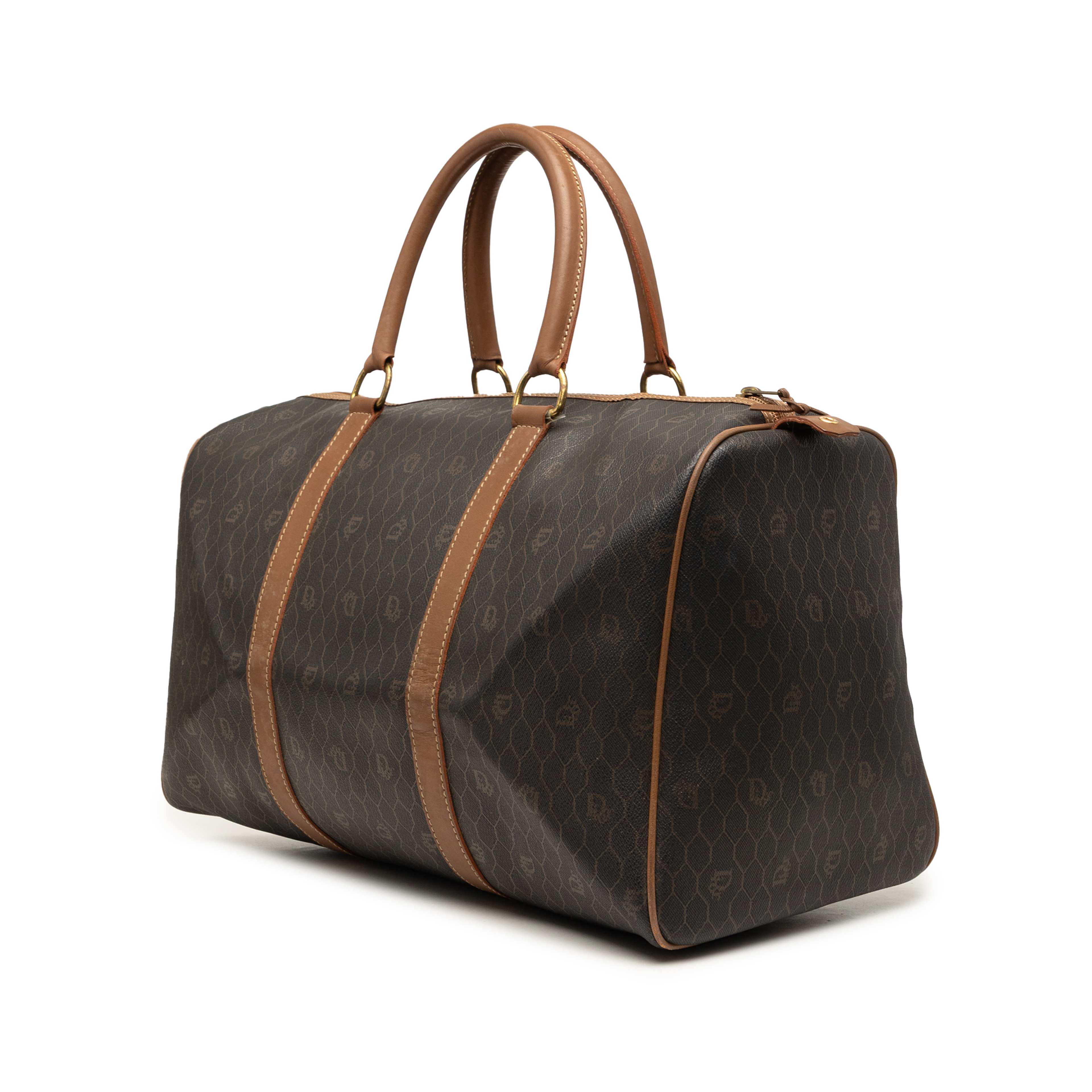 Dior Honeycomb Coated Canvas Travel Bag, från Luxclusif, i färgen svart. Klicka för att öppna bilden i stort format