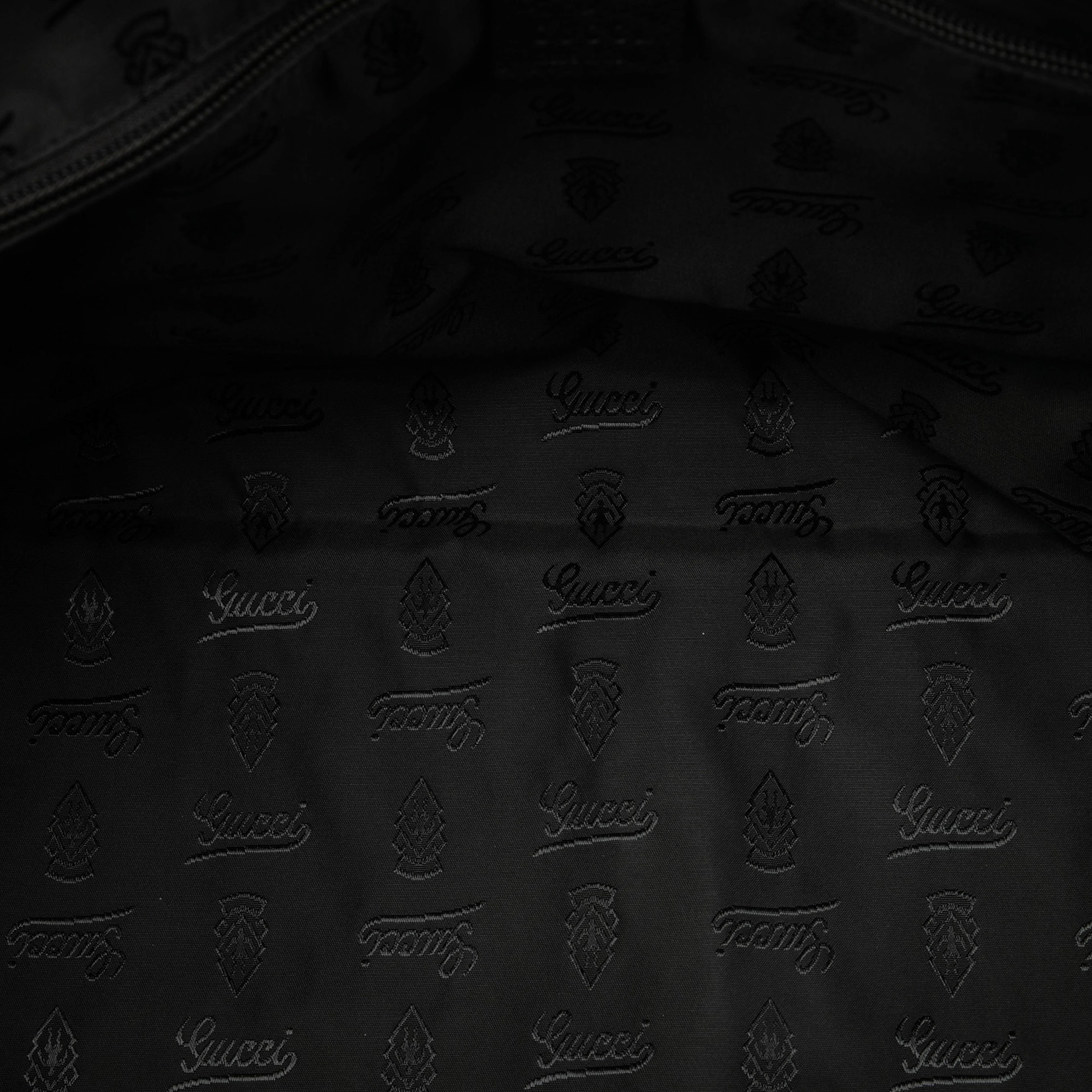 Gucci Guccissima Weekender, från Luxclusif, i färgen dark brown. Klicka för att öppna bilden i stort format