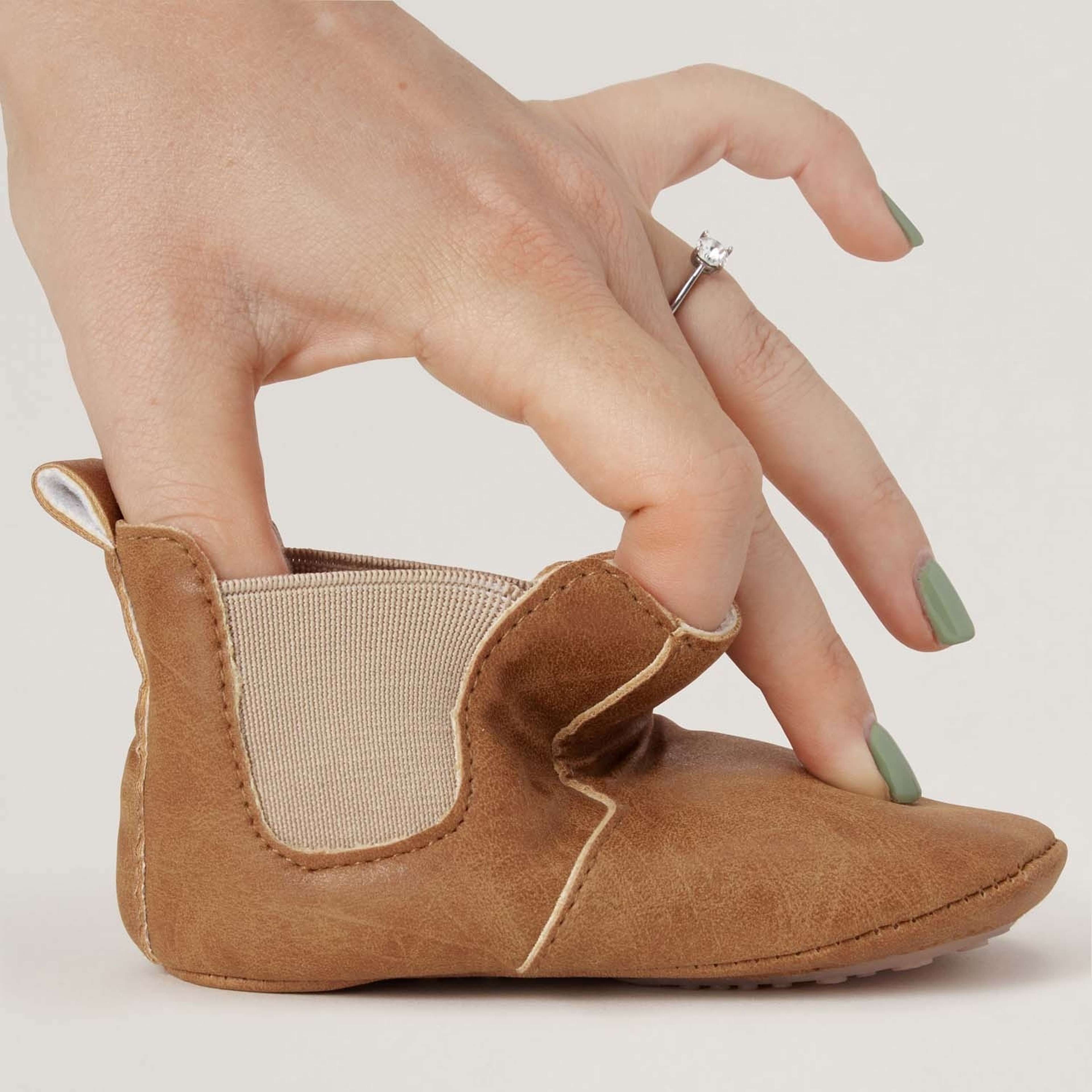 Wonderland Boots, från BabyMocs, i färgen black. Klicka för att öppna bilden i stort format