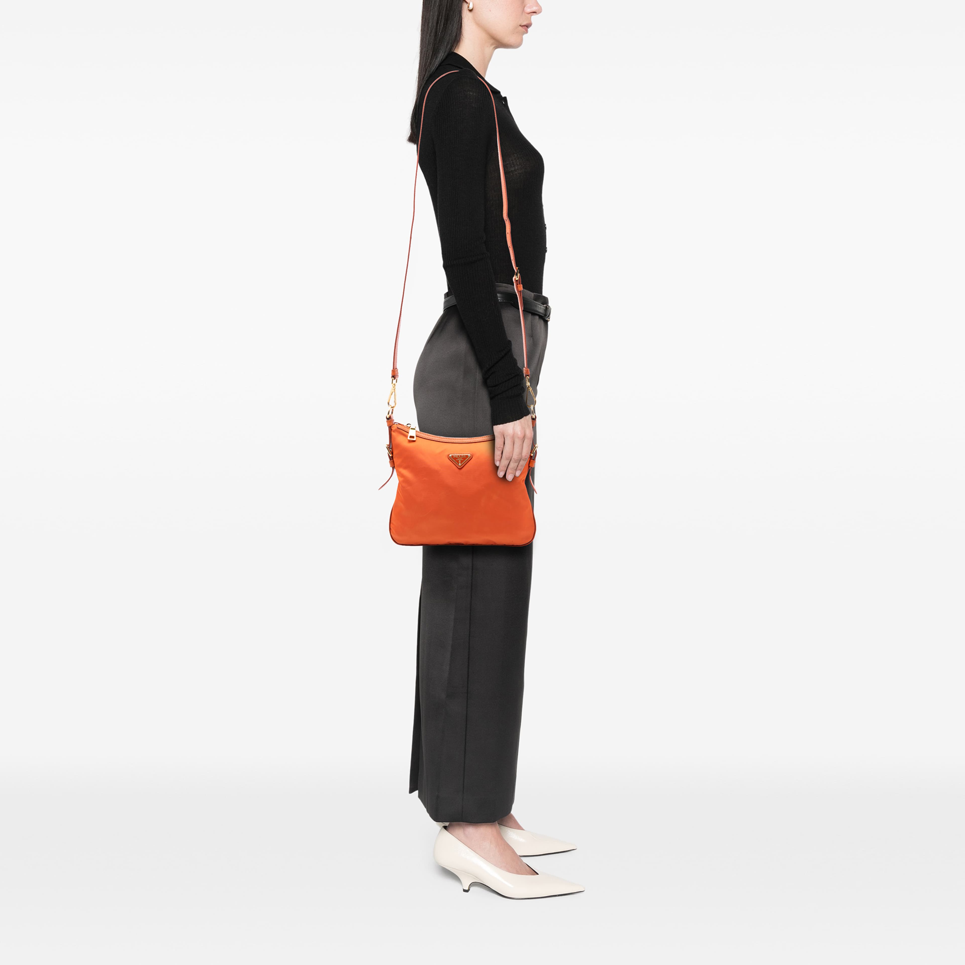 Prada Saffiano Trimmed Tessuto Zip Top Crossbody, från Luxclusif, i färgen orange. Klicka för att öppna bilden i stort format