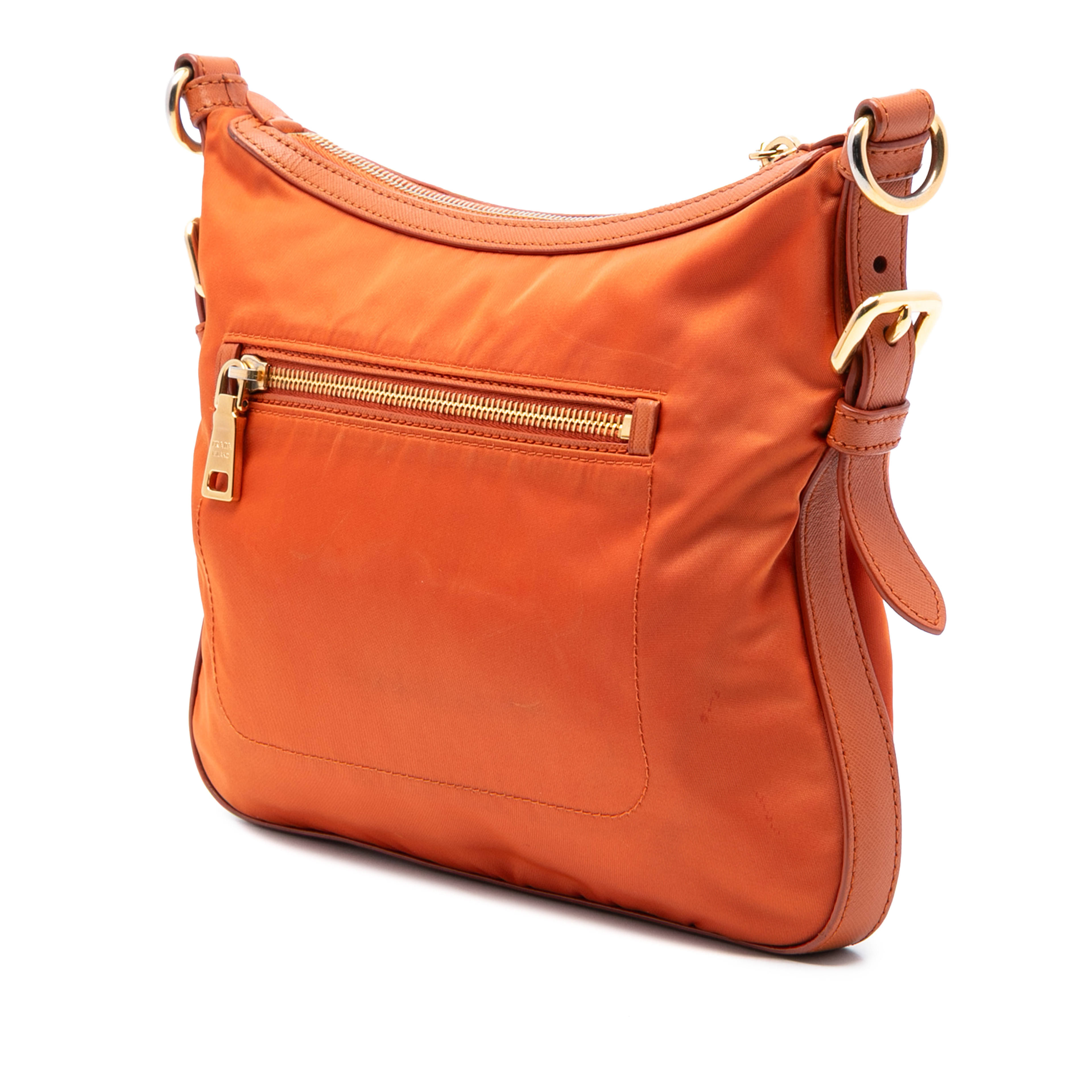 Prada Saffiano Trimmed Tessuto Zip Top Crossbody, från Luxclusif, i färgen orange. Klicka för att öppna bilden i stort format