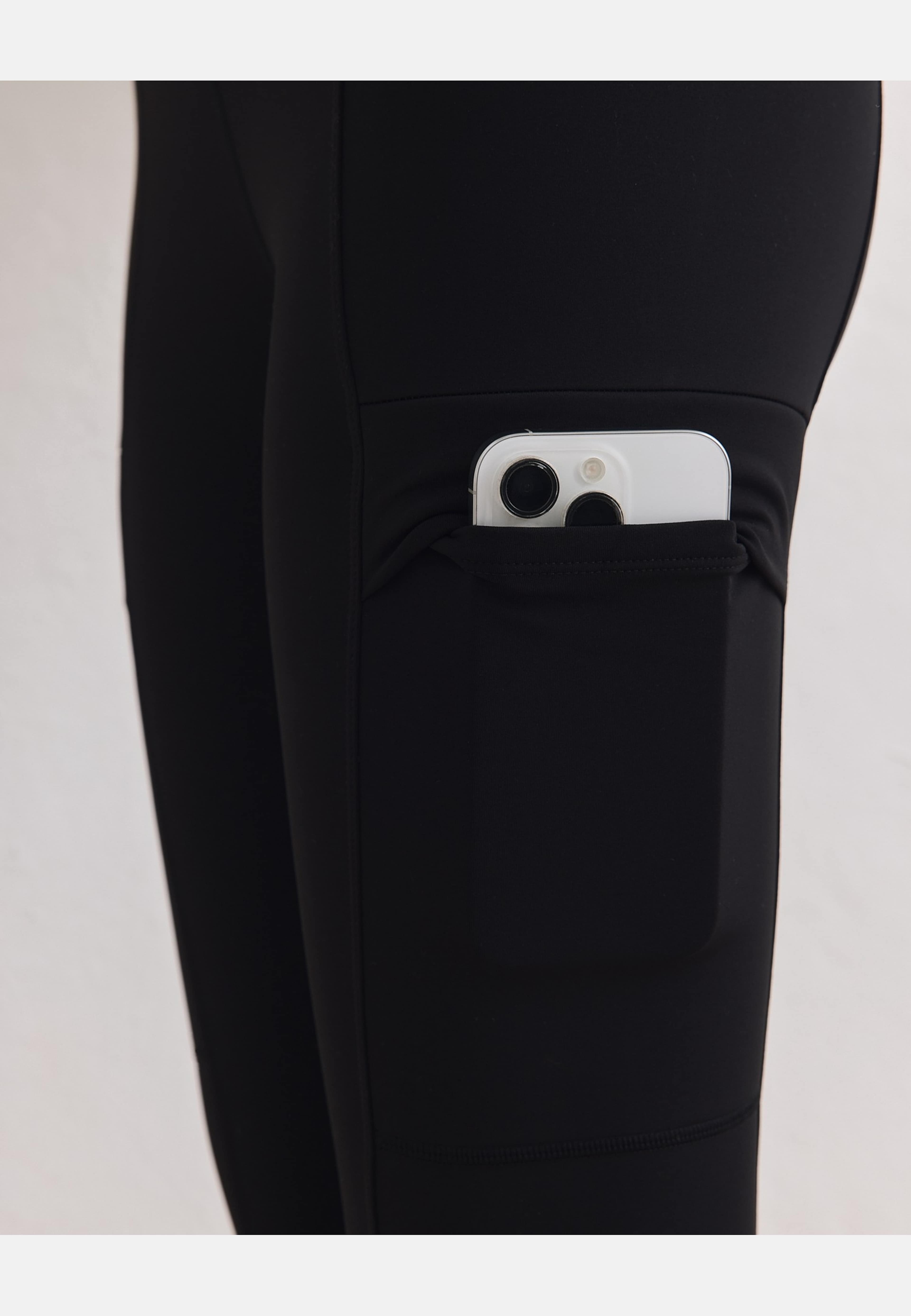 Warming Pocket Tights, från aim'n, i färgen black. Klicka för att öppna bilden i stort format