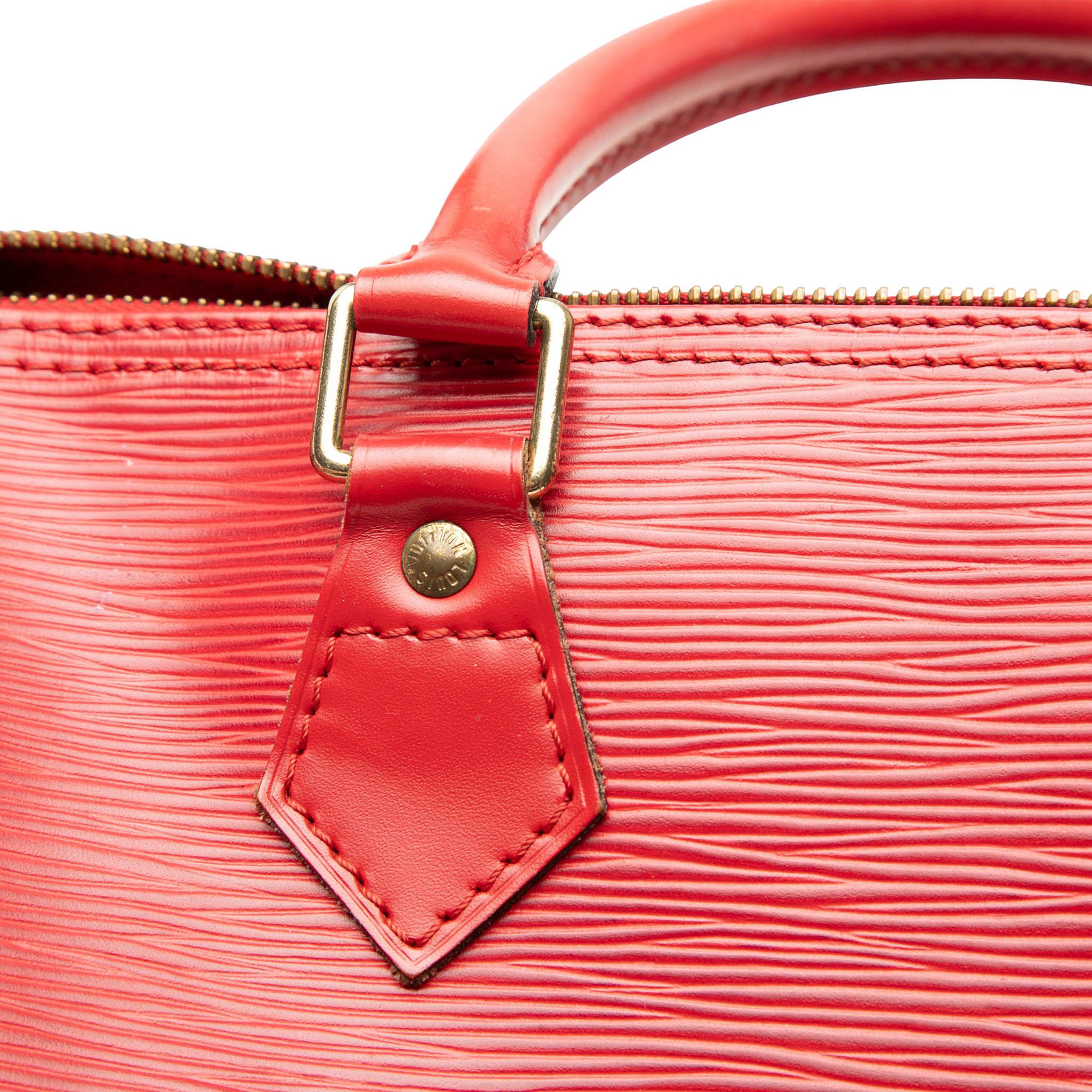 Louis Vuitton Epi Speedy 30, från Luxclusif, i färgen röd. Klicka för att öppna bilden i stort format