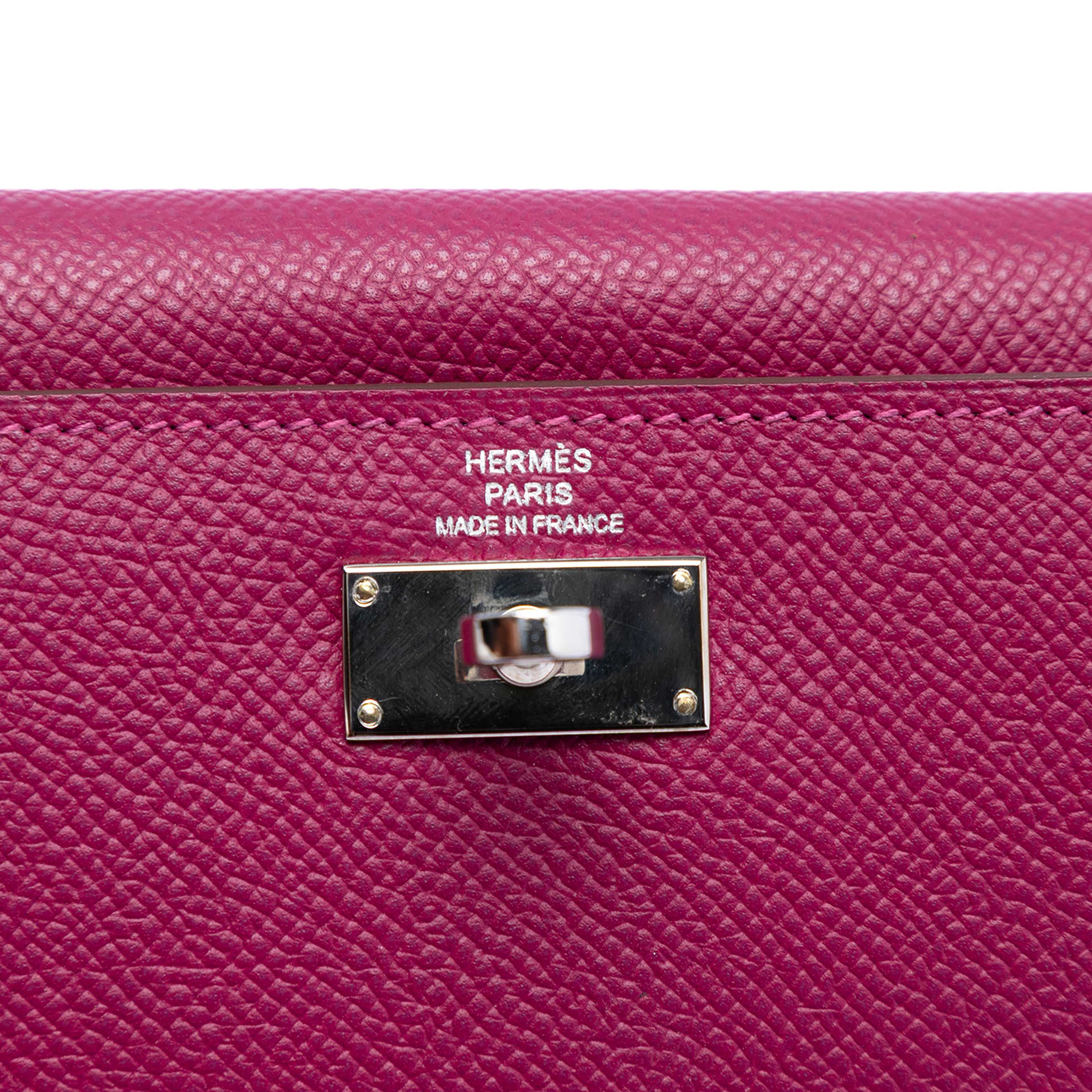 Hermès Epsom Kelly Longue Wallet, från Luxclusif, i färgen magenta. Klicka för att öppna bilden i stort format