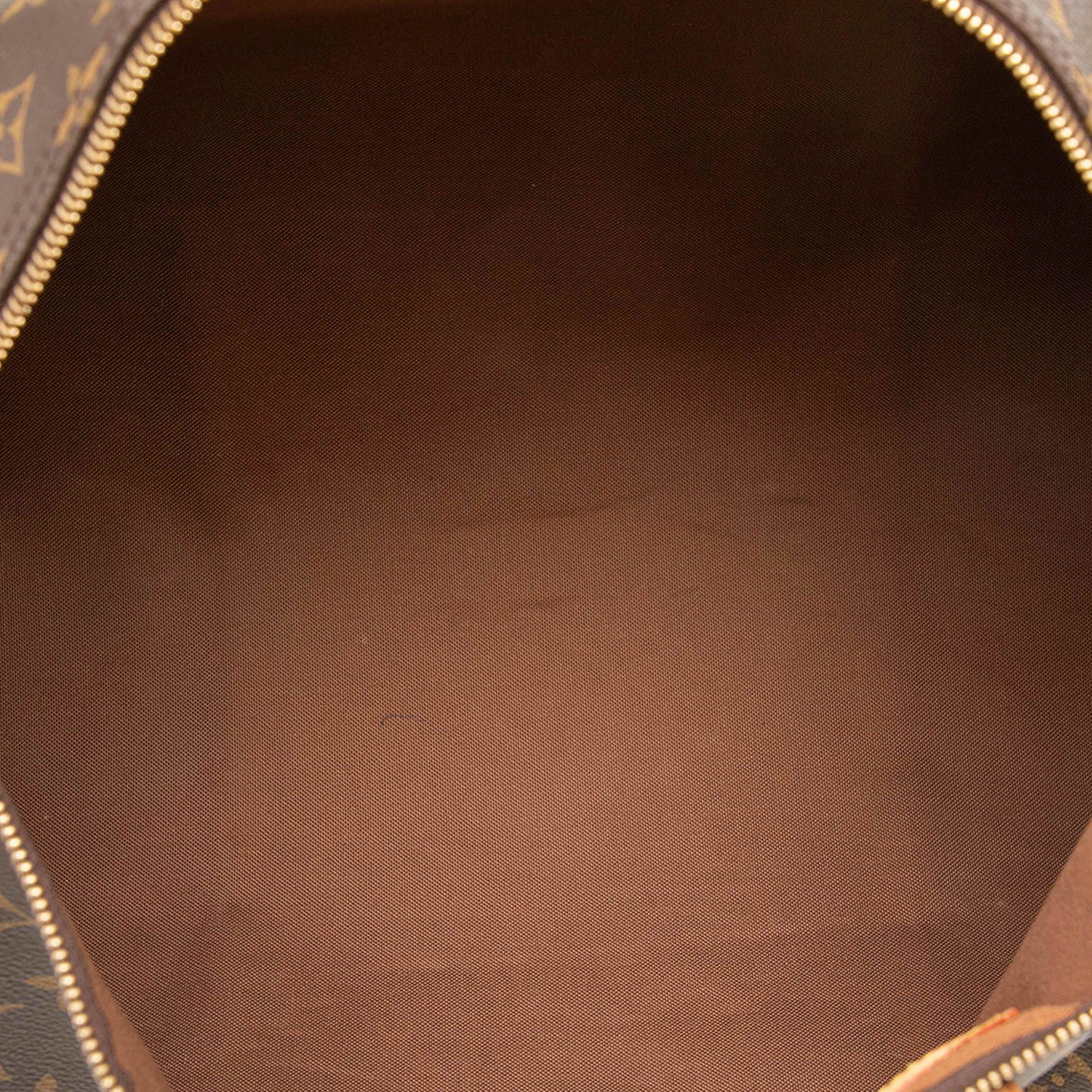 Louis Vuitton Monogram Speedy 40, från Luxclusif, i färgen brun. Klicka för att öppna bilden i stort format