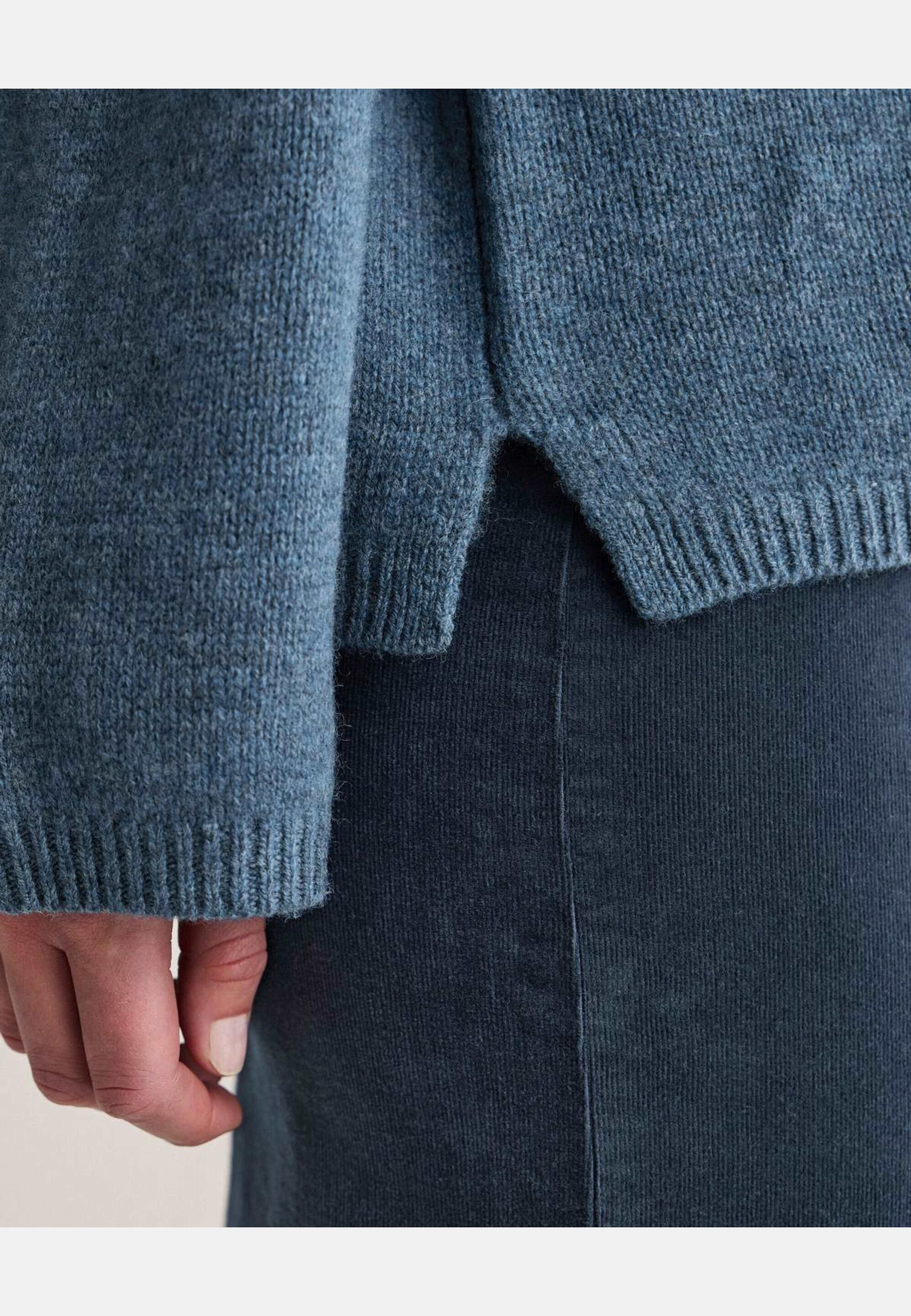 Polotröja Alva, från Newhouse, i färgen blå. Klicka för att öppna bilden i stort format