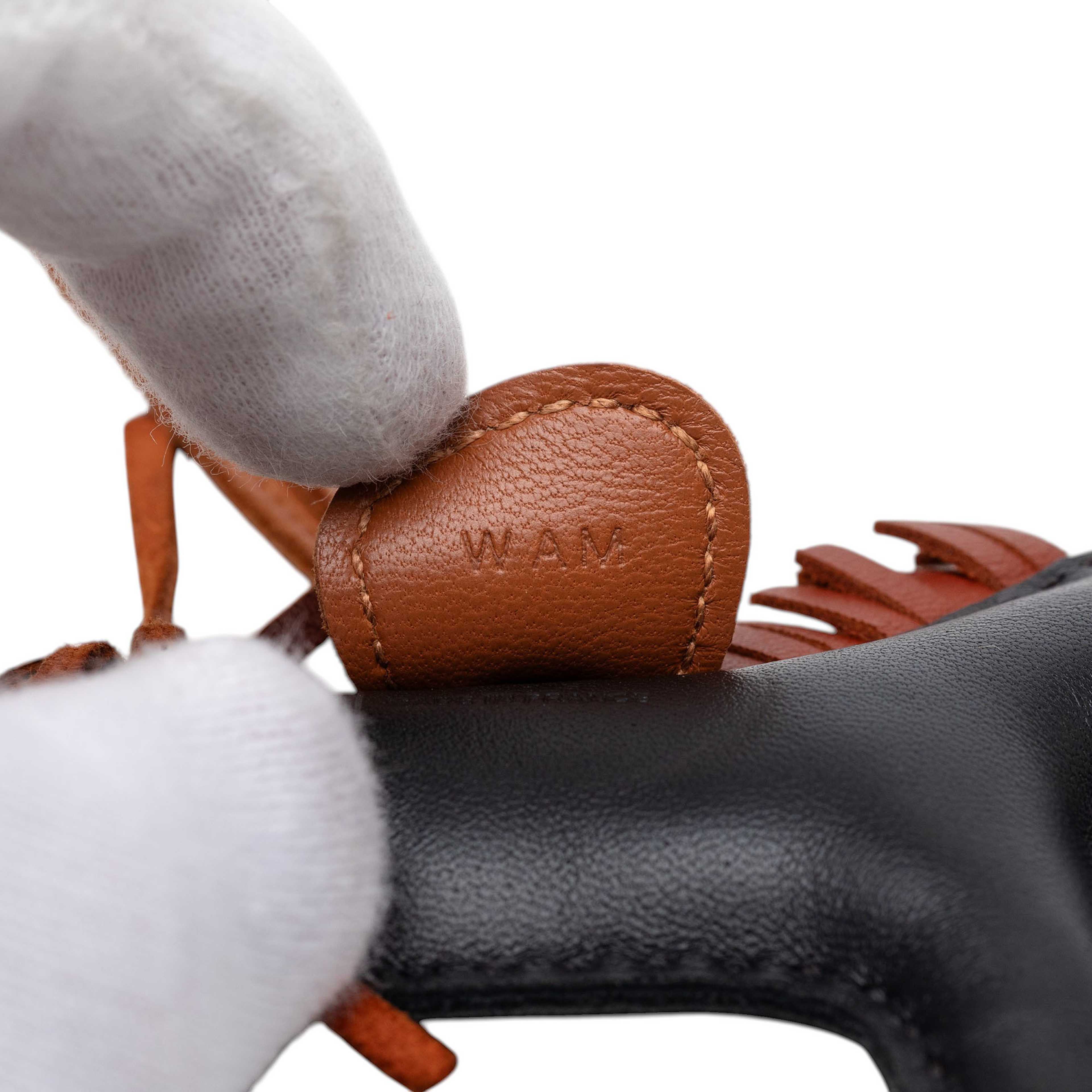 Hermès Milo Lambskin Grigri Rodeo Bag Charm Pm, från Luxclusif, i färgen svart. Klicka för att öppna bilden i stort format