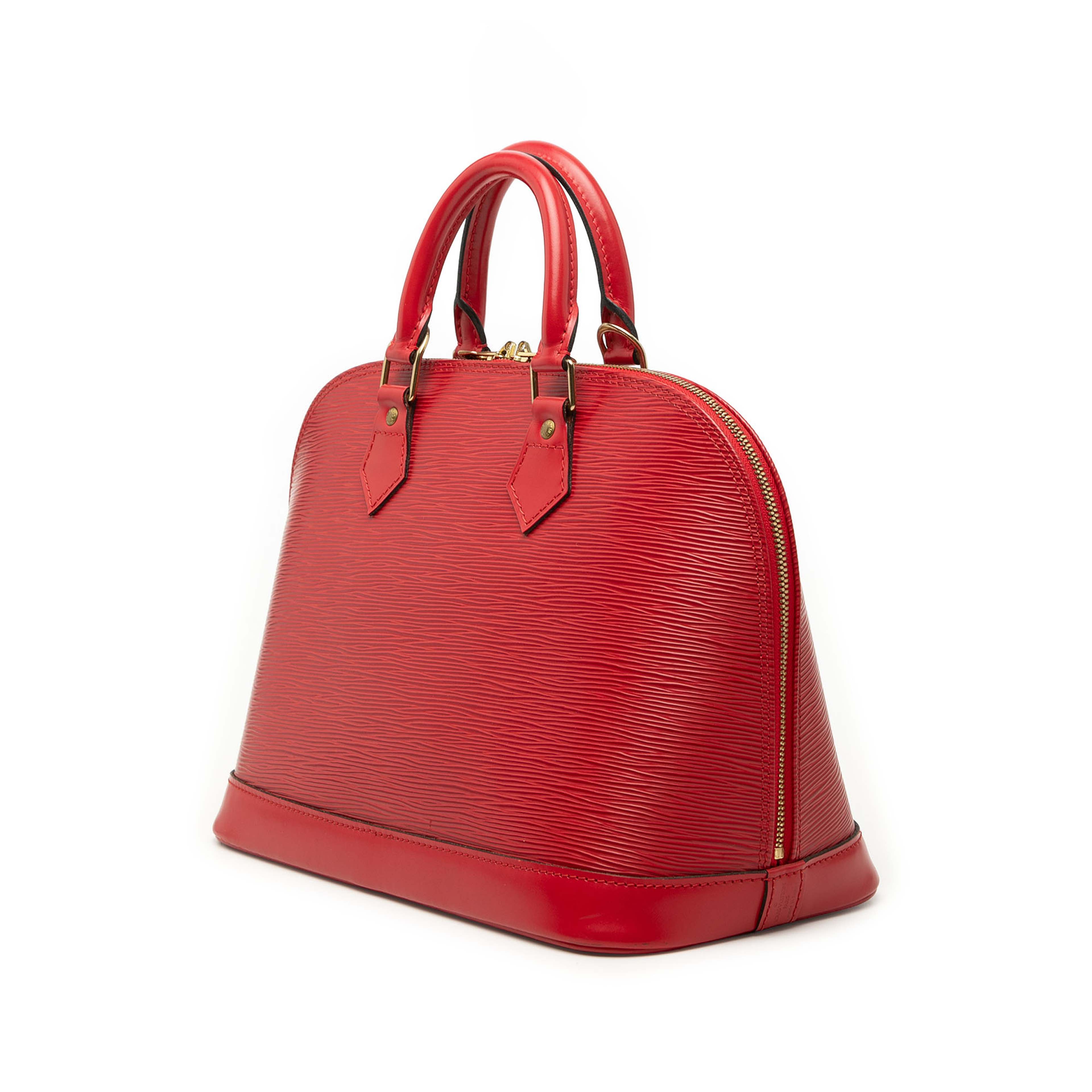 Louis Vuitton Epi Alma Pm, från Luxclusif, i färgen röd. Klicka för att öppna bilden i stort format