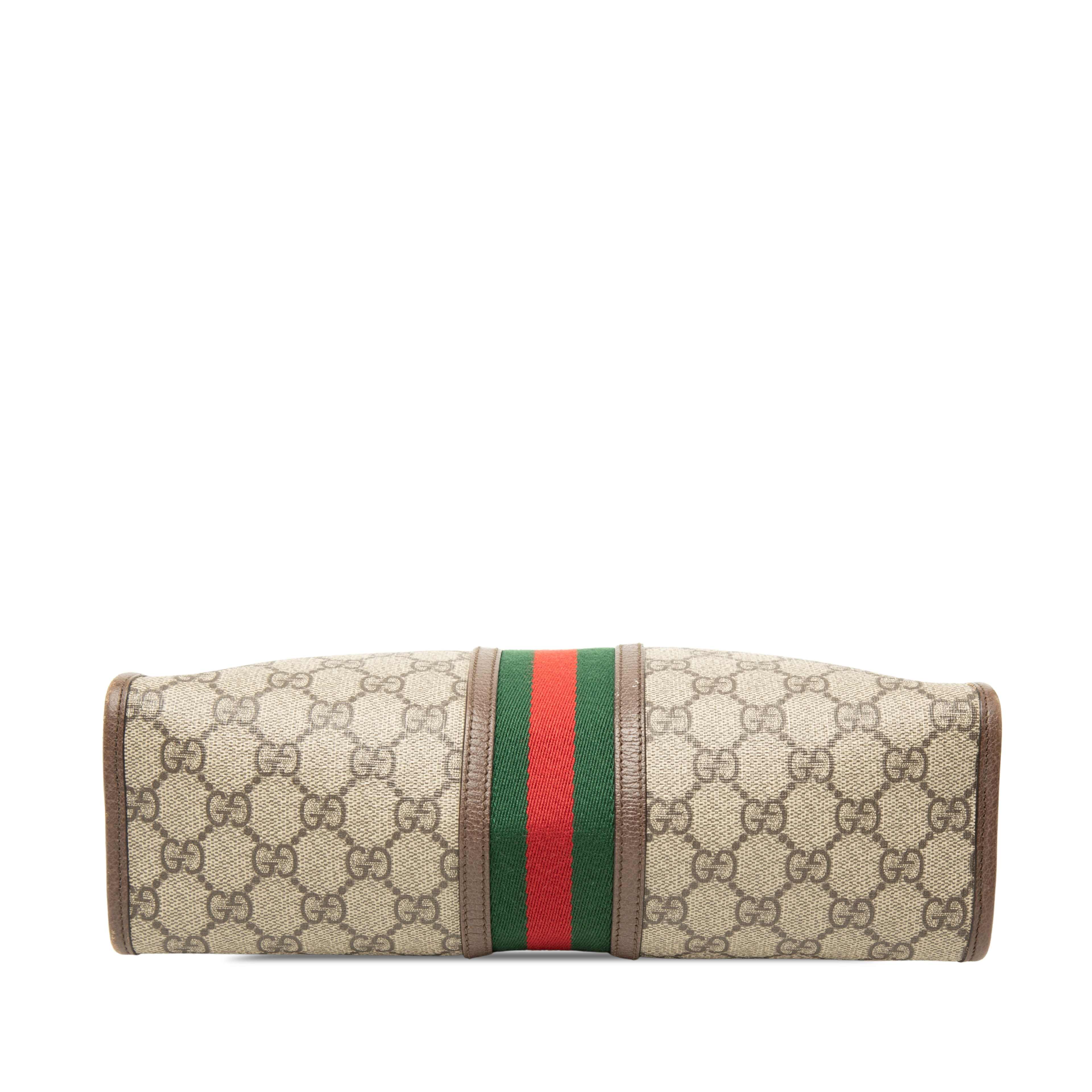Gucci Gg Supreme Web Ophidia Clutch, från Luxclusif, i färgen beige. Klicka för att öppna bilden i stort format