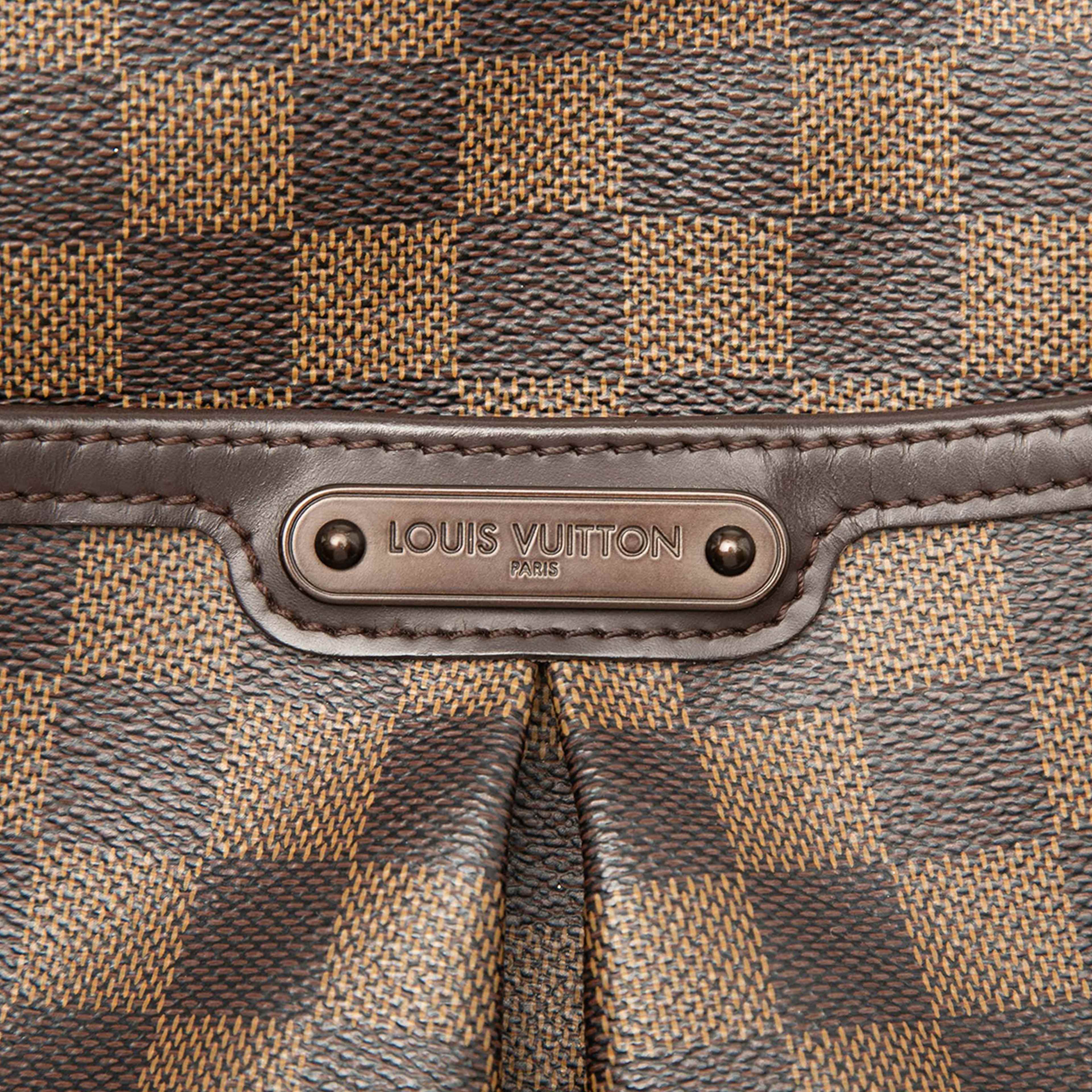 Louis Vuitton Damier Ebene Bloomsbury Pm, från Luxclusif, i färgen brun. Klicka för att öppna bilden i stort format