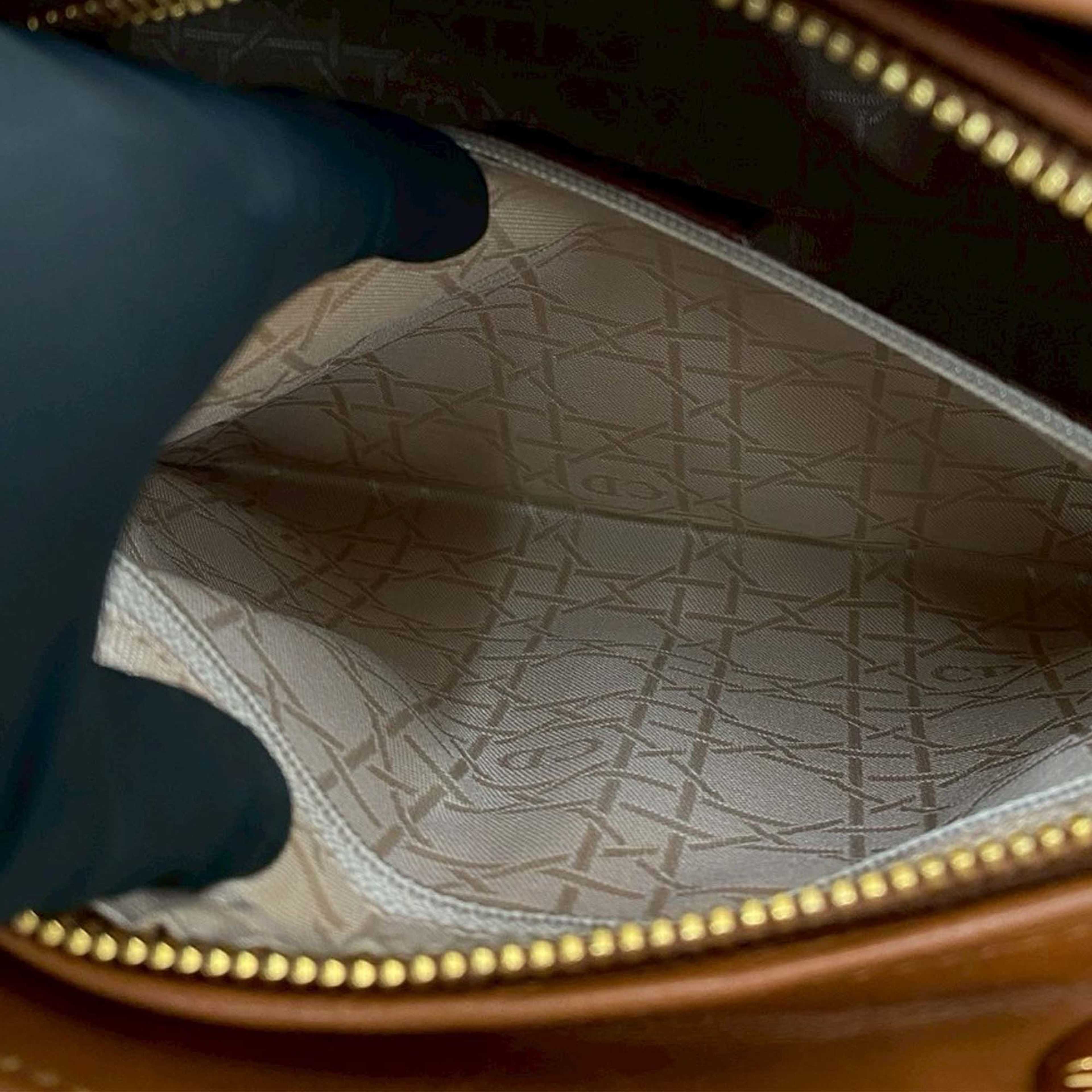 Dior Medium Lambskin Cannage Lady Dior, från Luxclusif, i färgen brown. Klicka för att öppna bilden i stort format