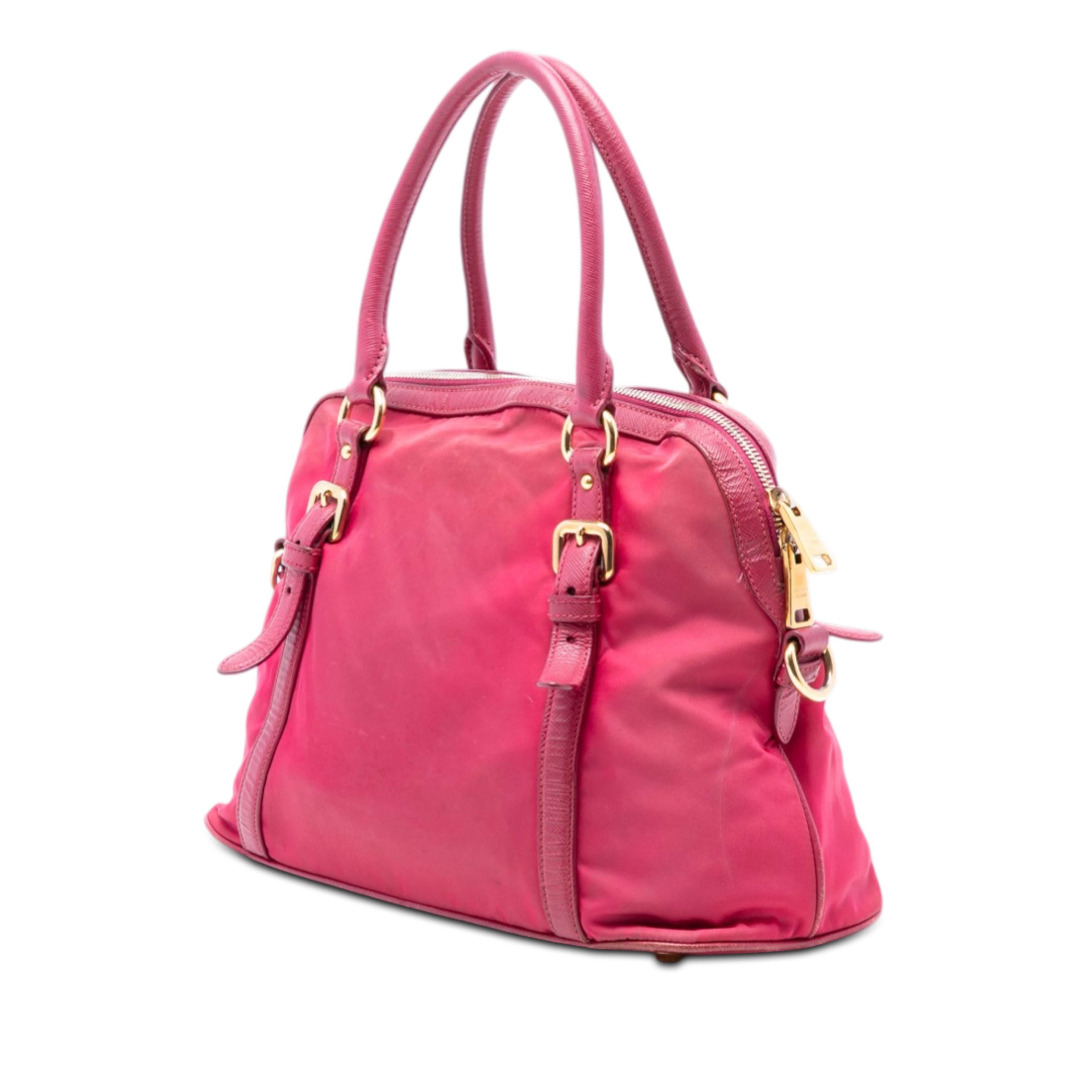 Prada Saffiano Trimmed Tessuto Dome Satchel, från Luxclusif, i färgen dark pink. Klicka för att öppna bilden i stort format