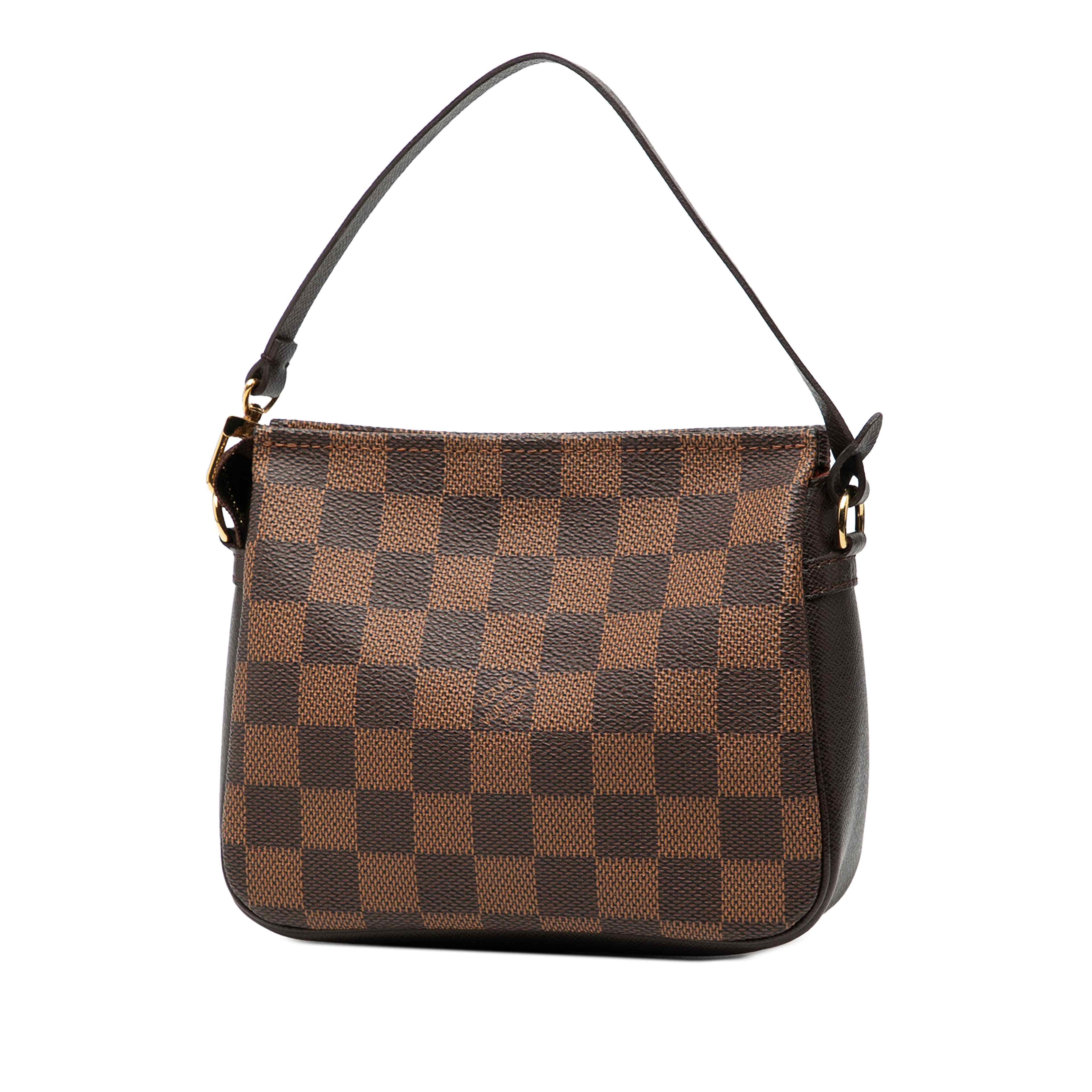 Louis Vuitton Damier Ebene Trousse Pochette, från Luxclusif, i färgen brown. Klicka för att öppna bilden i stort format