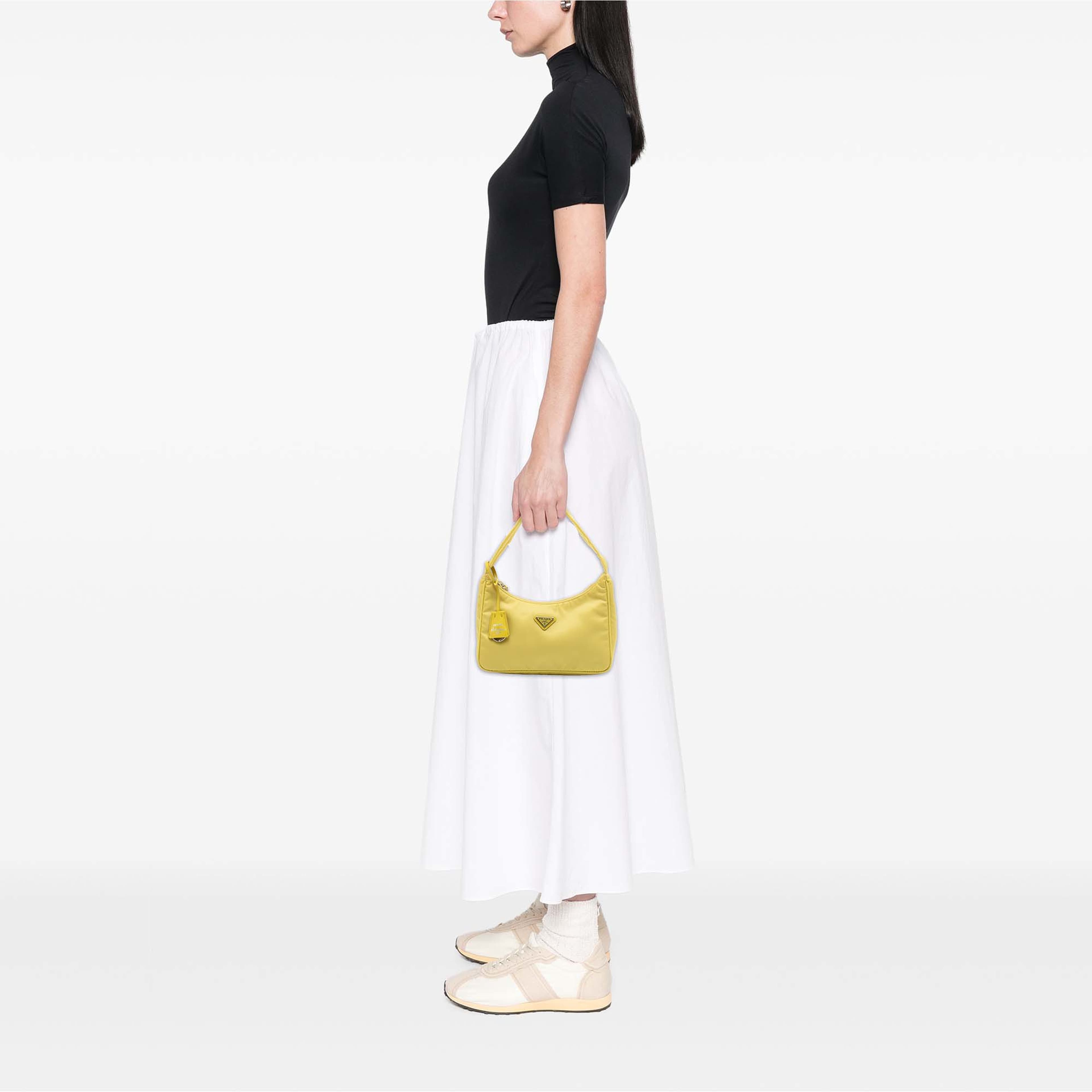 Prada Mini Tessuto Re Edition 2000 Shoulder Bag, från Luxclusif, i färgen gul. Klicka för att öppna bilden i stort format