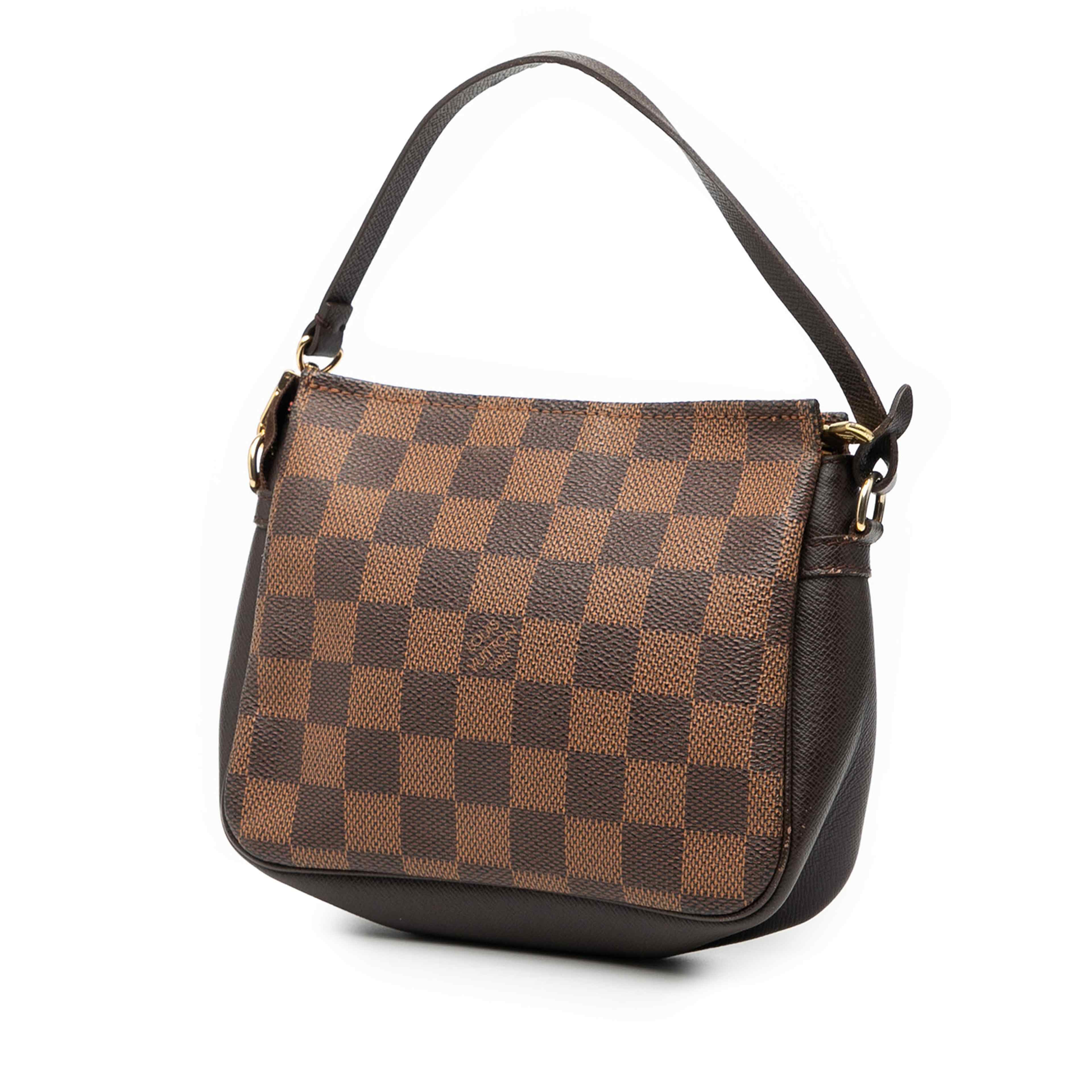 Louis Vuitton Damier Ebene Trousse Pochette, från Luxclusif, i färgen brown. Klicka för att öppna bilden i stort format