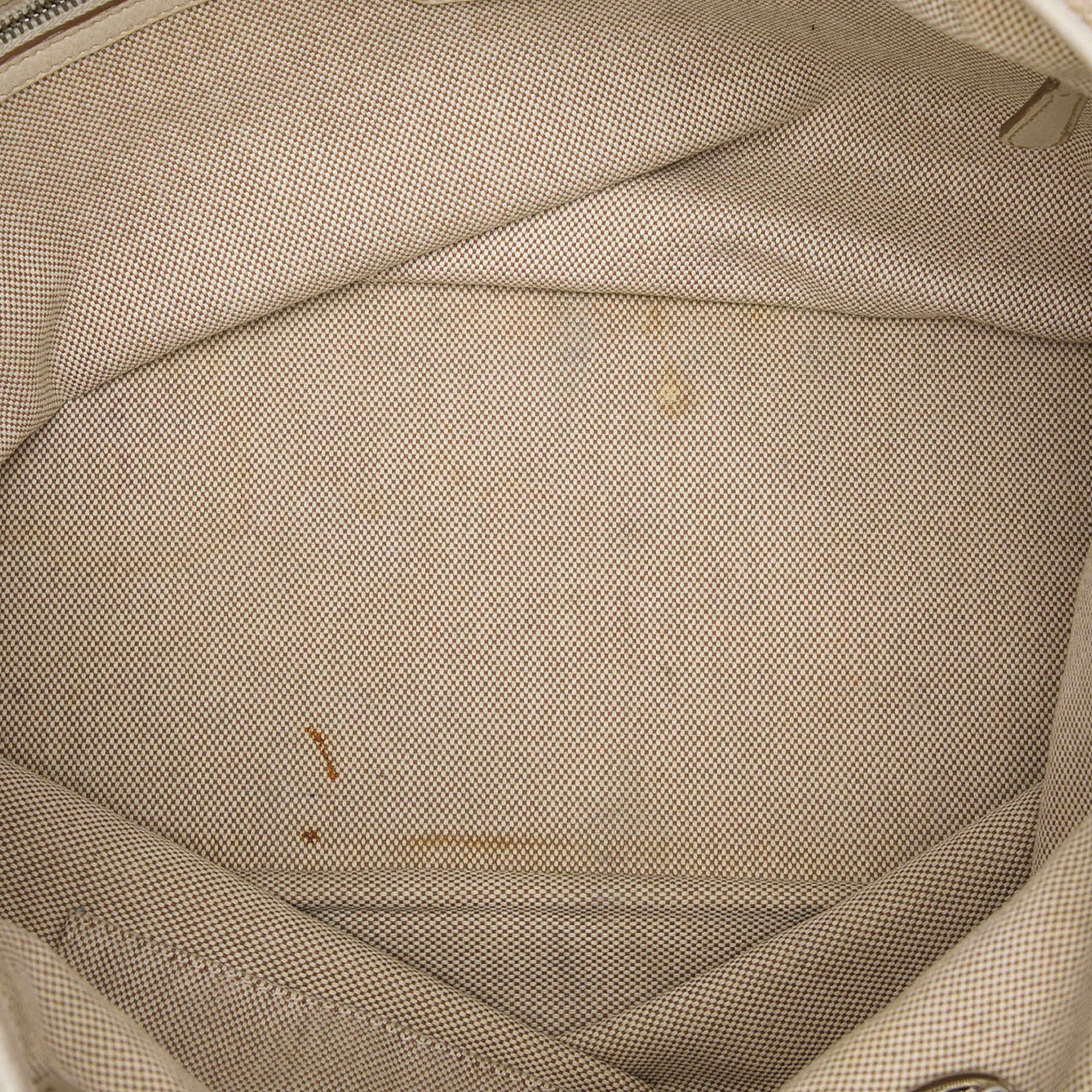 Dior Large Canvas Cannage Print Cherie Shopper Tote, från Luxclusif, i färgen beige. Klicka för att öppna bilden i stort format