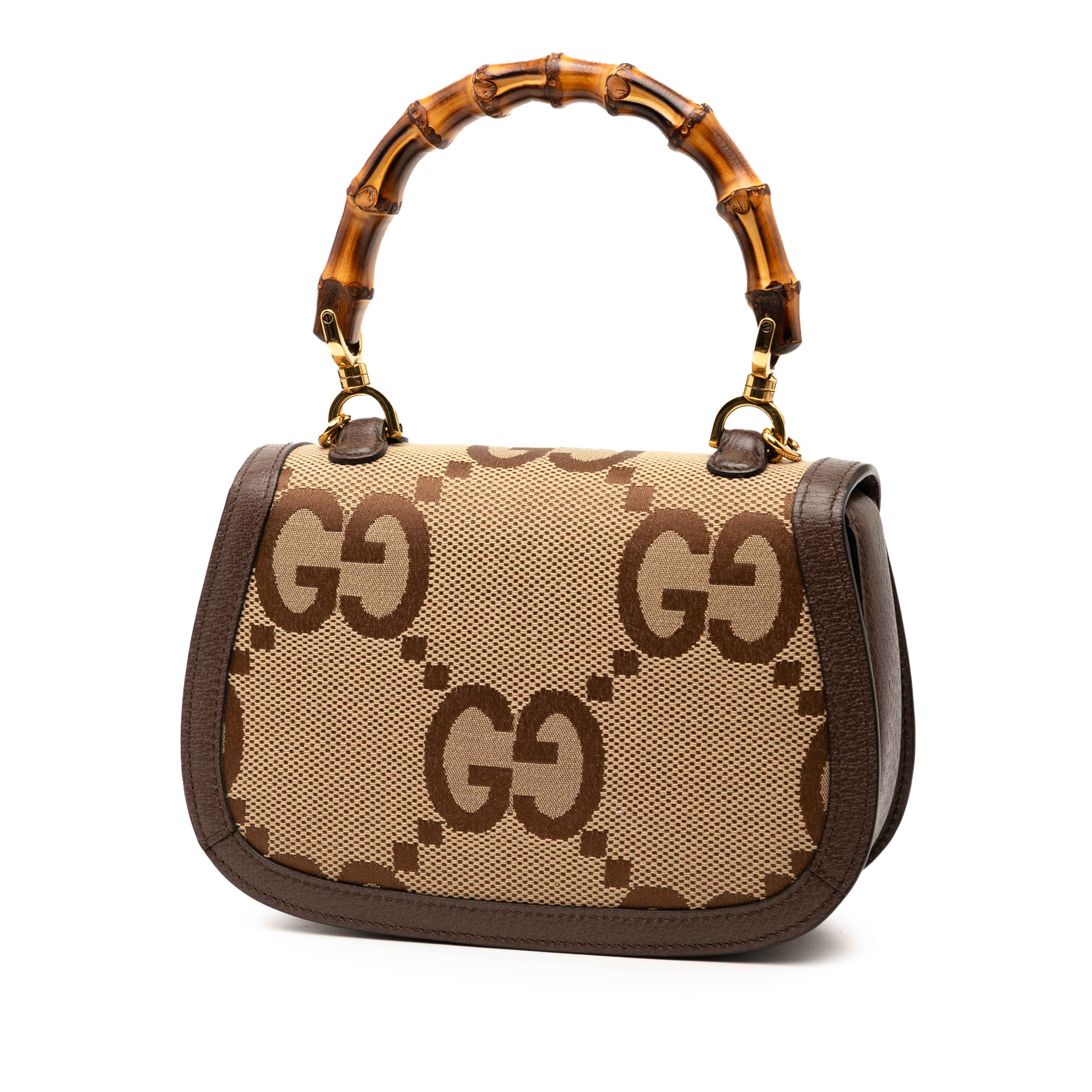 Gucci Small Jumbo Gg Canvas Bamboo 1947 Top Handle Bag, från Luxclusif, i färgen beige. Klicka för att öppna bilden i stort format