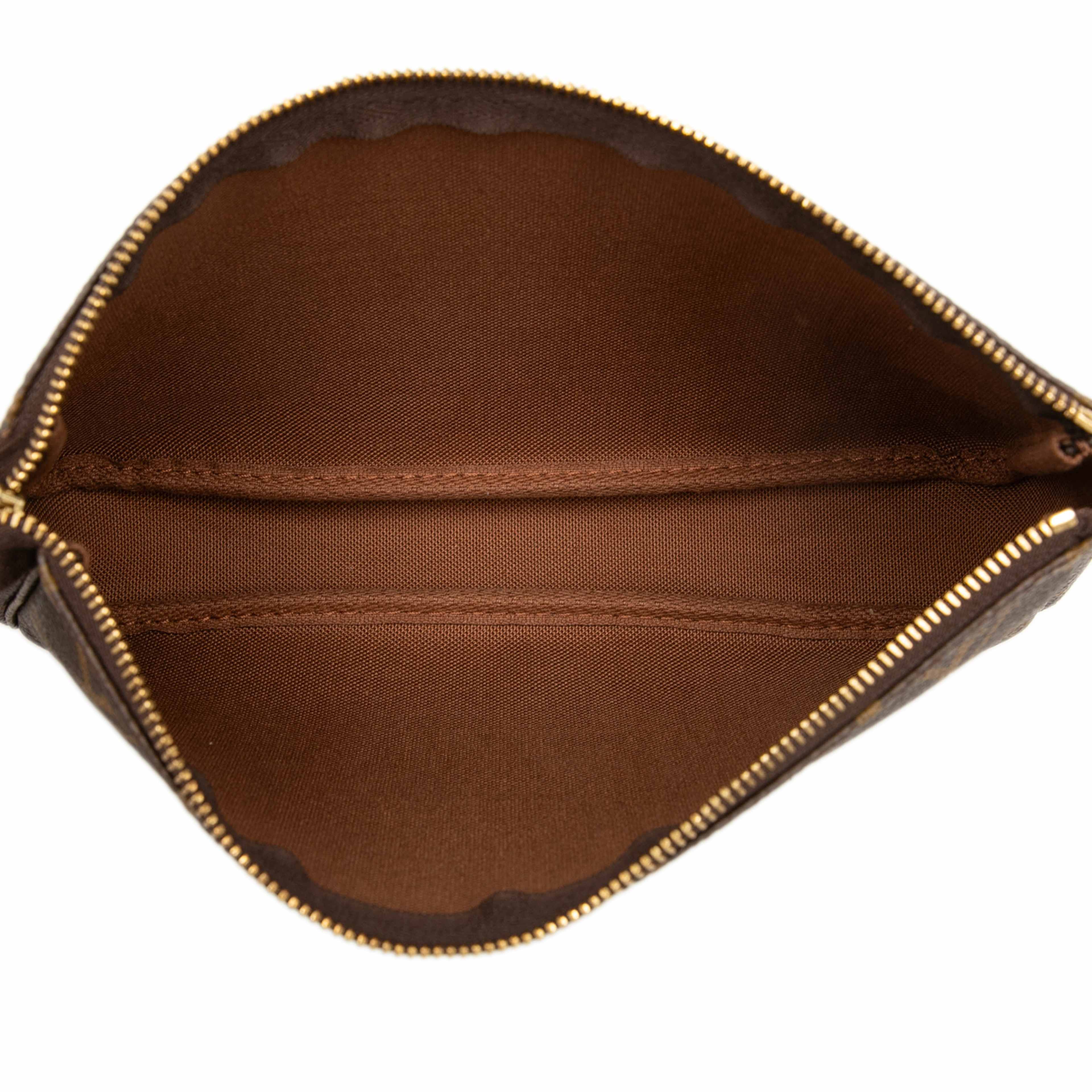 Louis Vuitton Monogram Pochette Accessoires, från Luxclusif, i färgen brun. Klicka för att öppna bilden i stort format