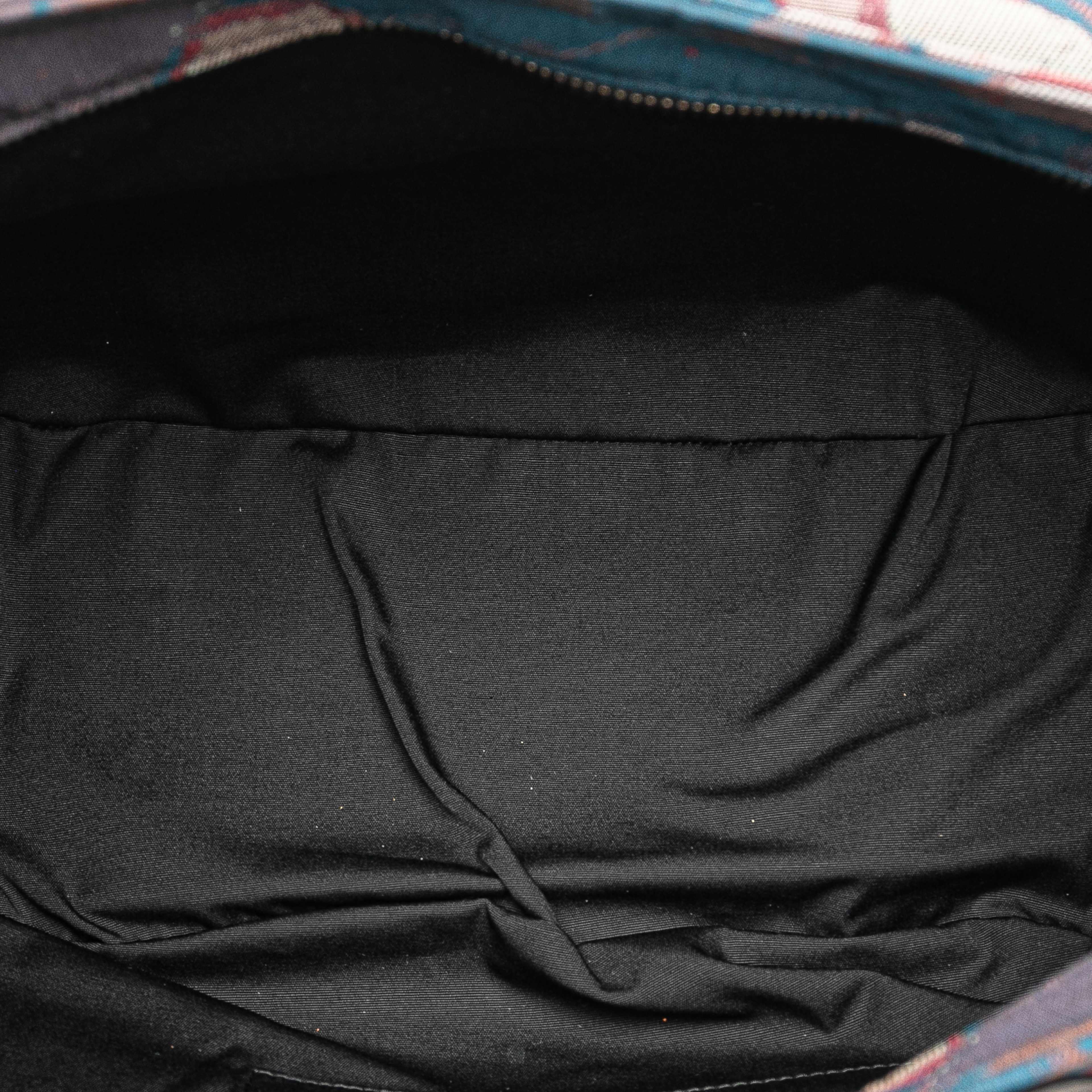 Dior Peter Doig Denim Camouflage Soft Saddle Bag, från Luxclusif, i färgen brown. Klicka för att öppna bilden i stort format